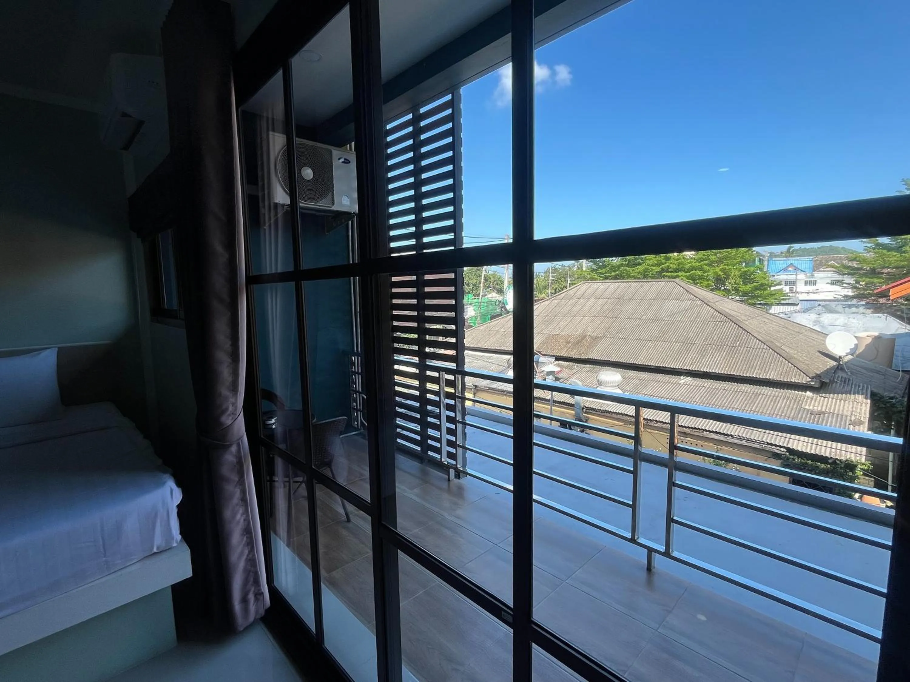 Balcony/Terrace, Bed in J & Ariya Hotel Near Samui Airport and Koh Phangan Pier