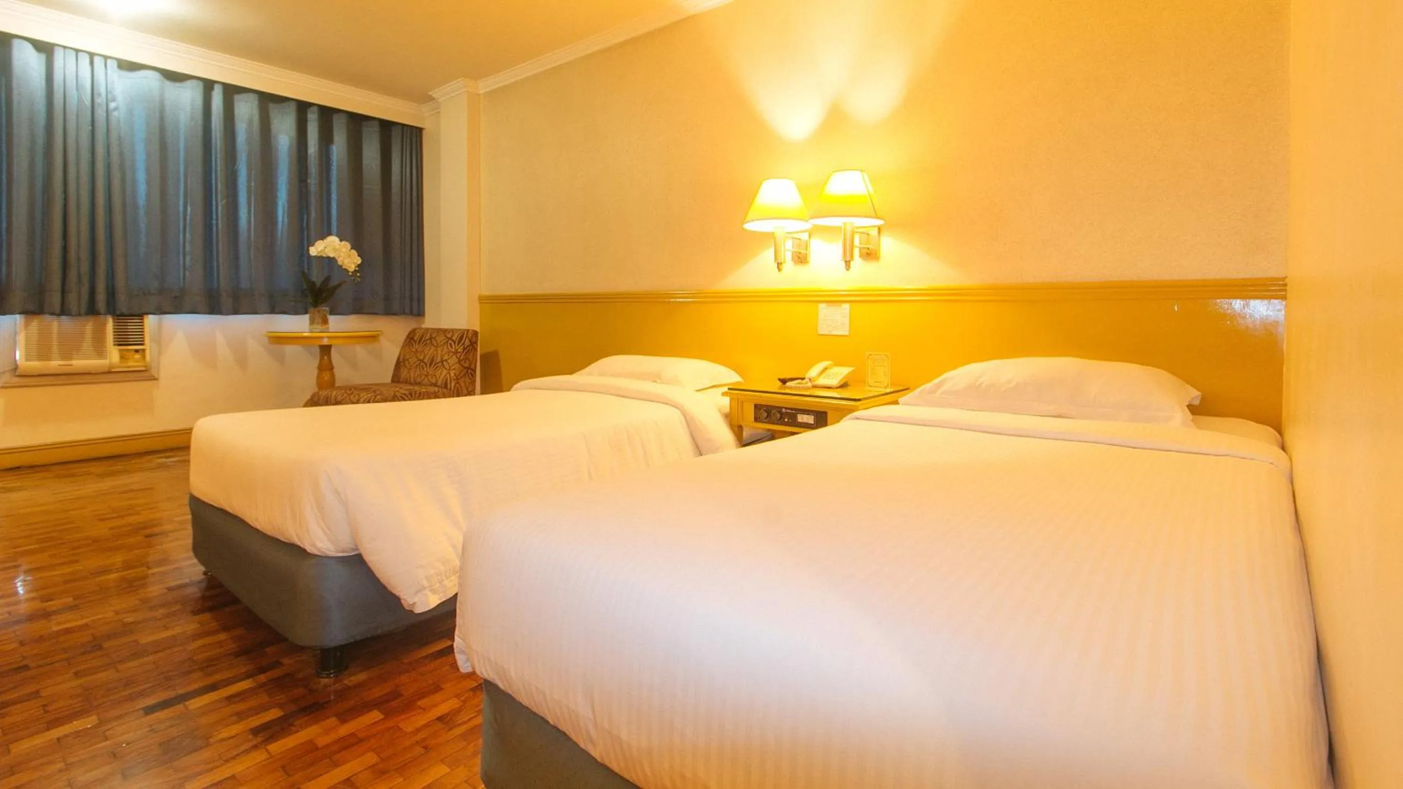 Bed in Aloha Hotel Roxas Boulevard Manila