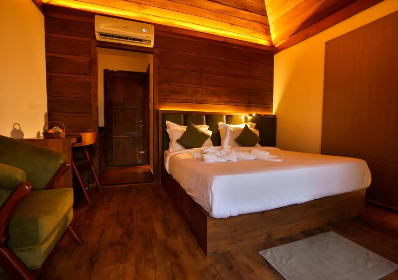 Bed in Chembarathi Wayanad Boutique Resort