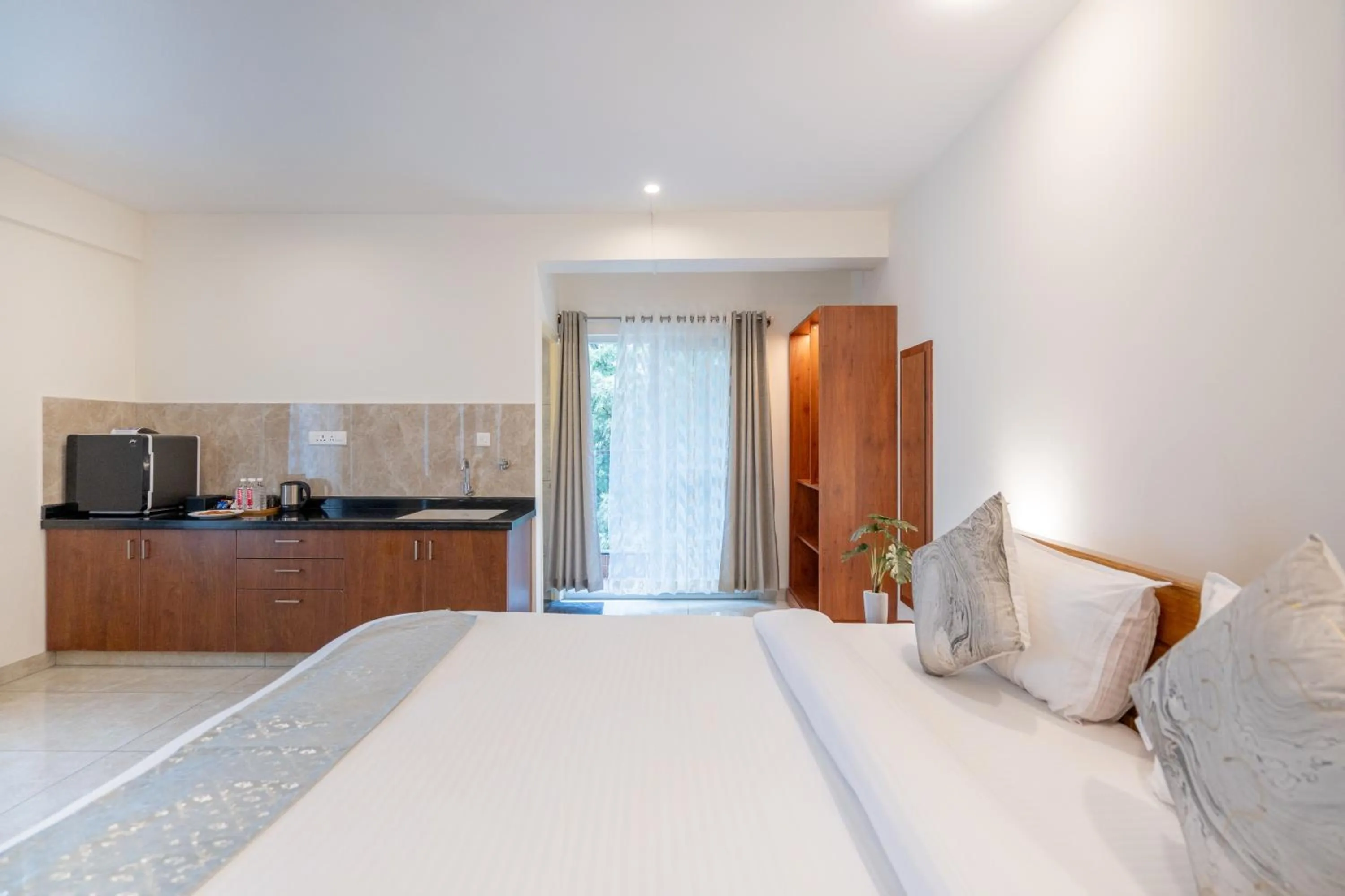 Bed in The Silver Chimes Suites