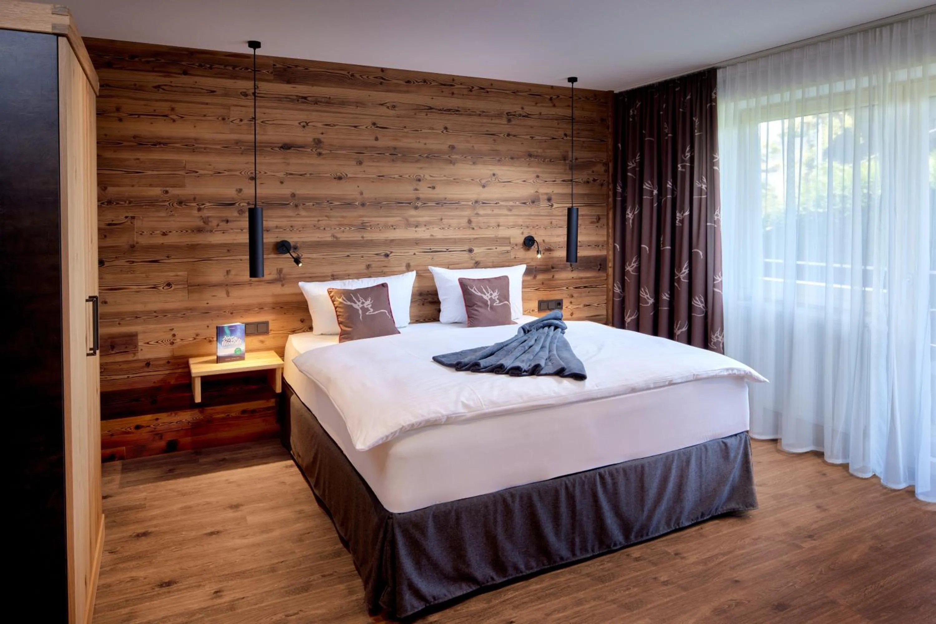 Bed in Maximilian Appartements