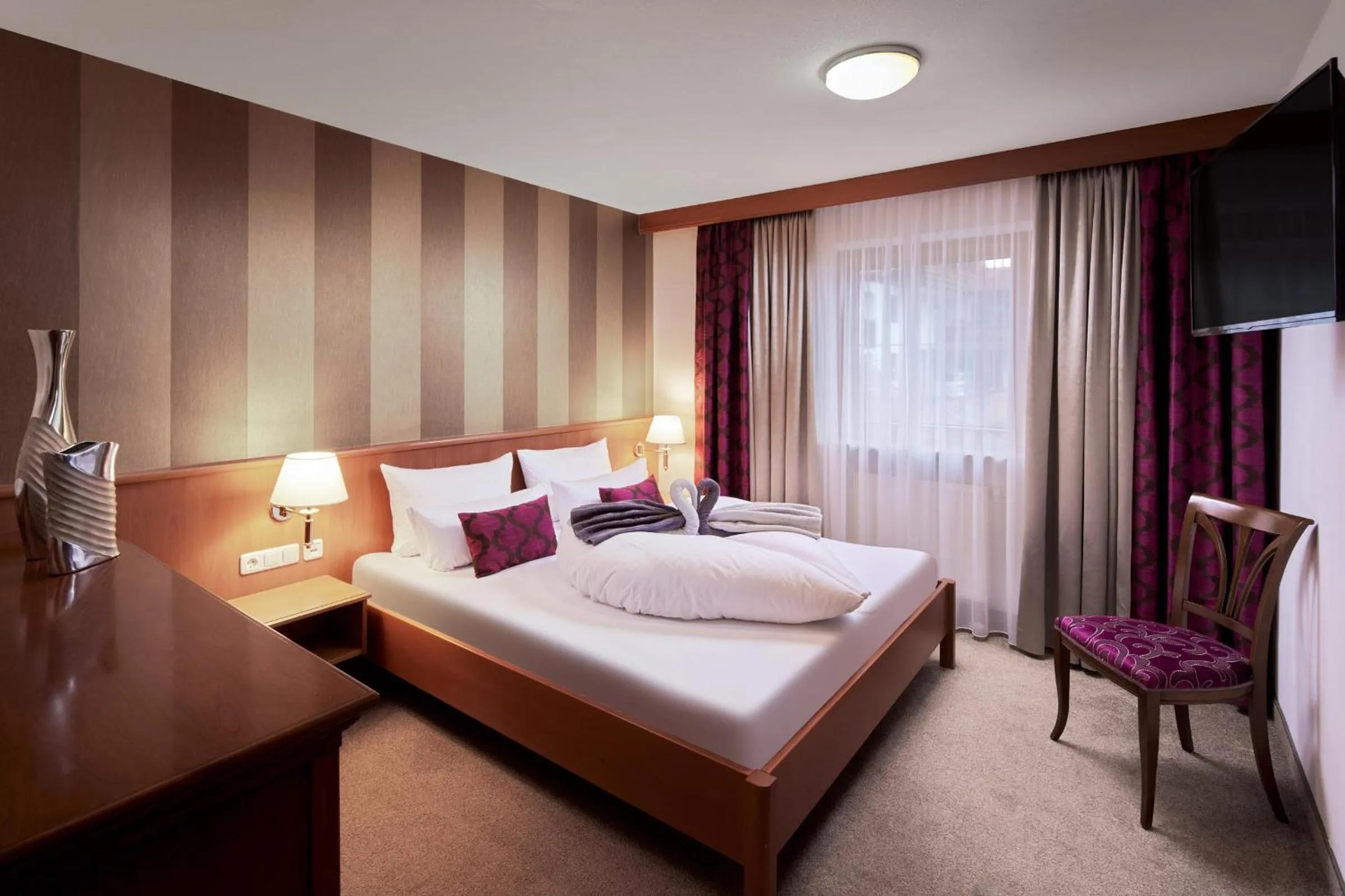 Bed in Maximilian Appartements