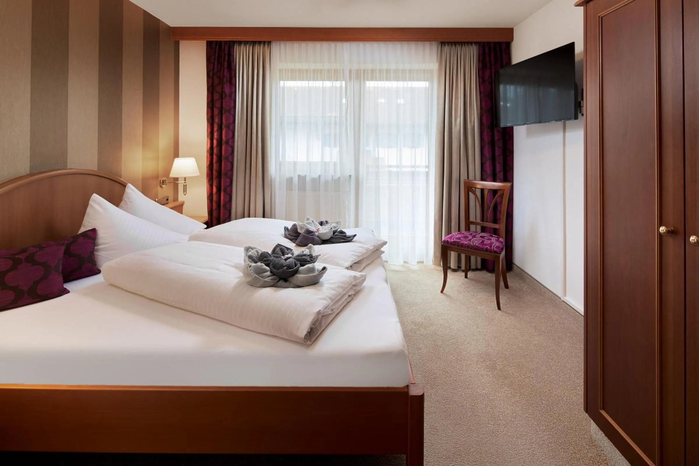 Bed in Maximilian Appartements