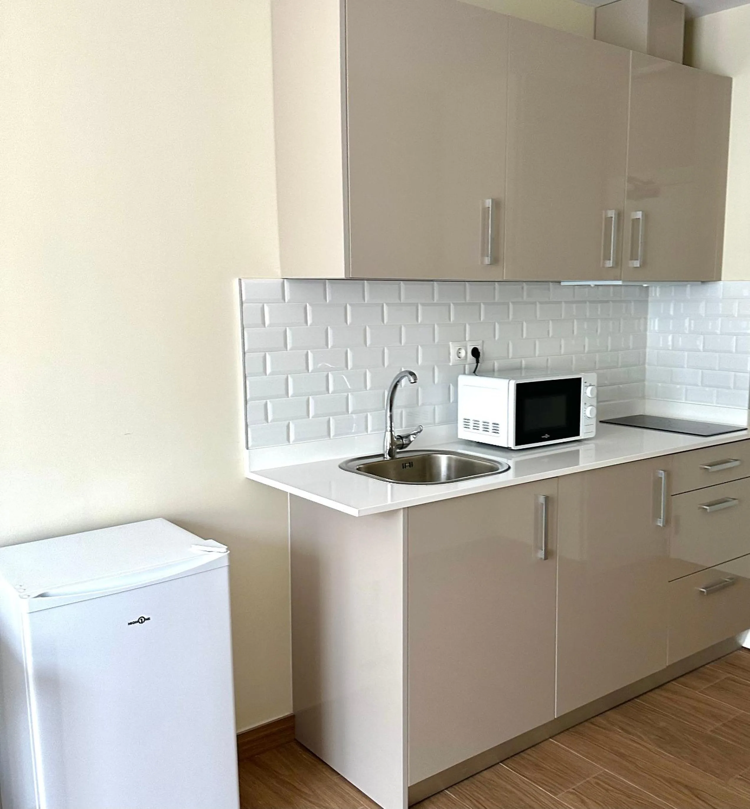 Kitchen or kitchenette in Apartahotel Golden Alcalá