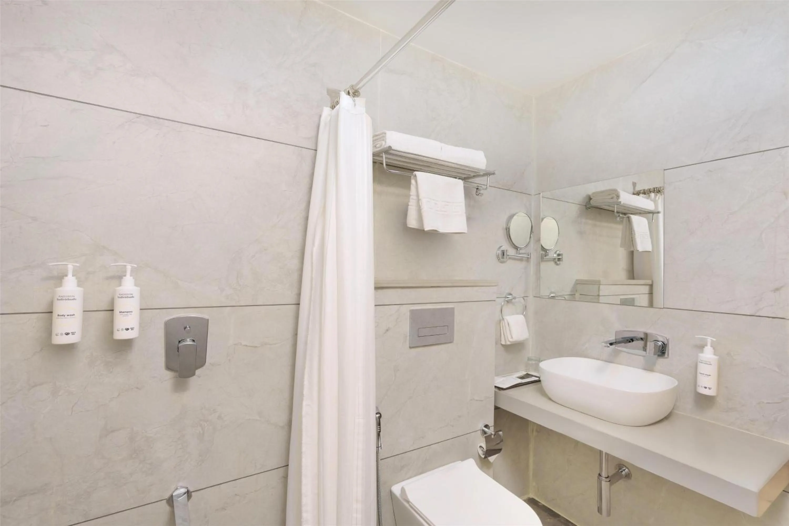 Bathroom in D Square Statue of Unity Kevadia, a member of Radisson Individuals