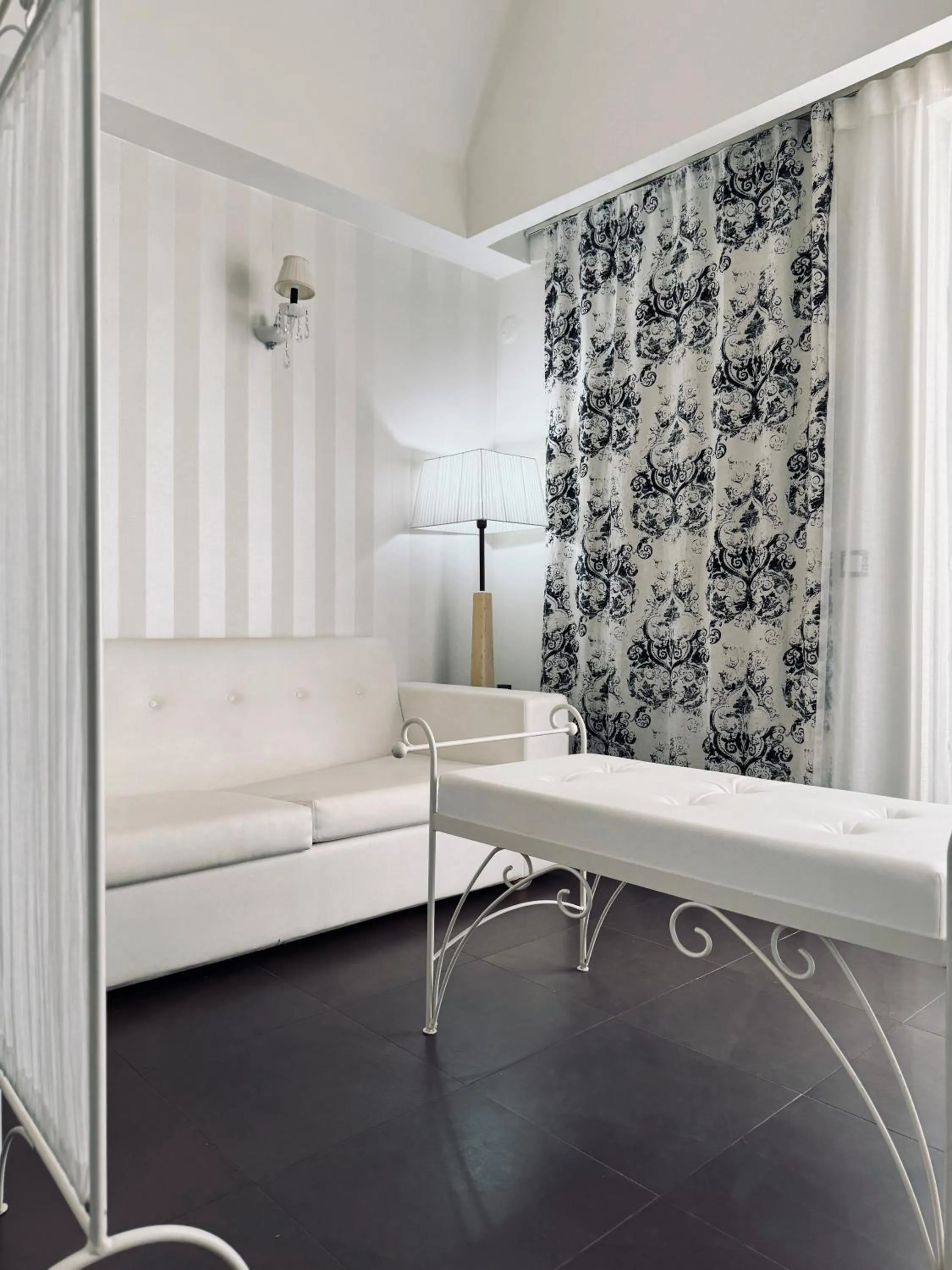 Seating area in Angela Suites Boutique Hotel