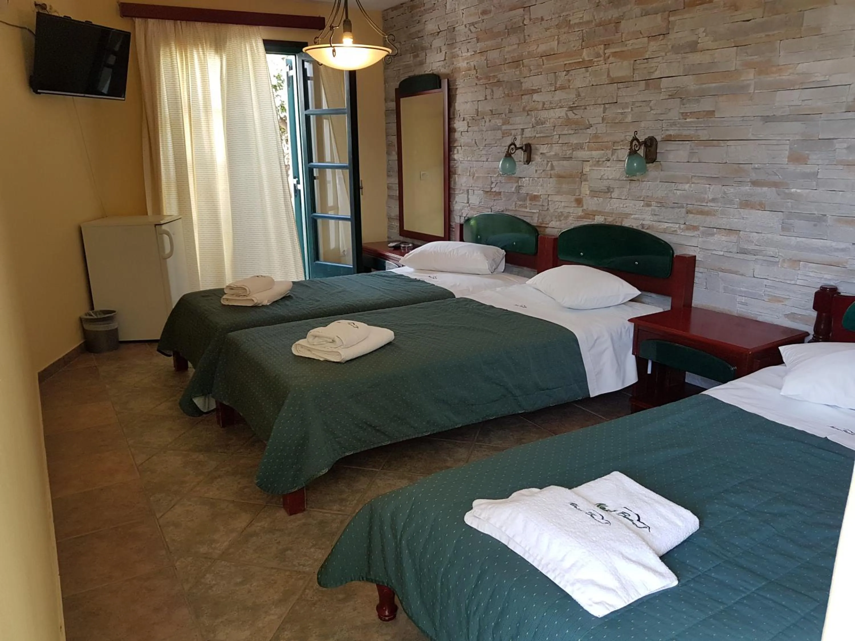 Bed in Hotel Naxos Beach