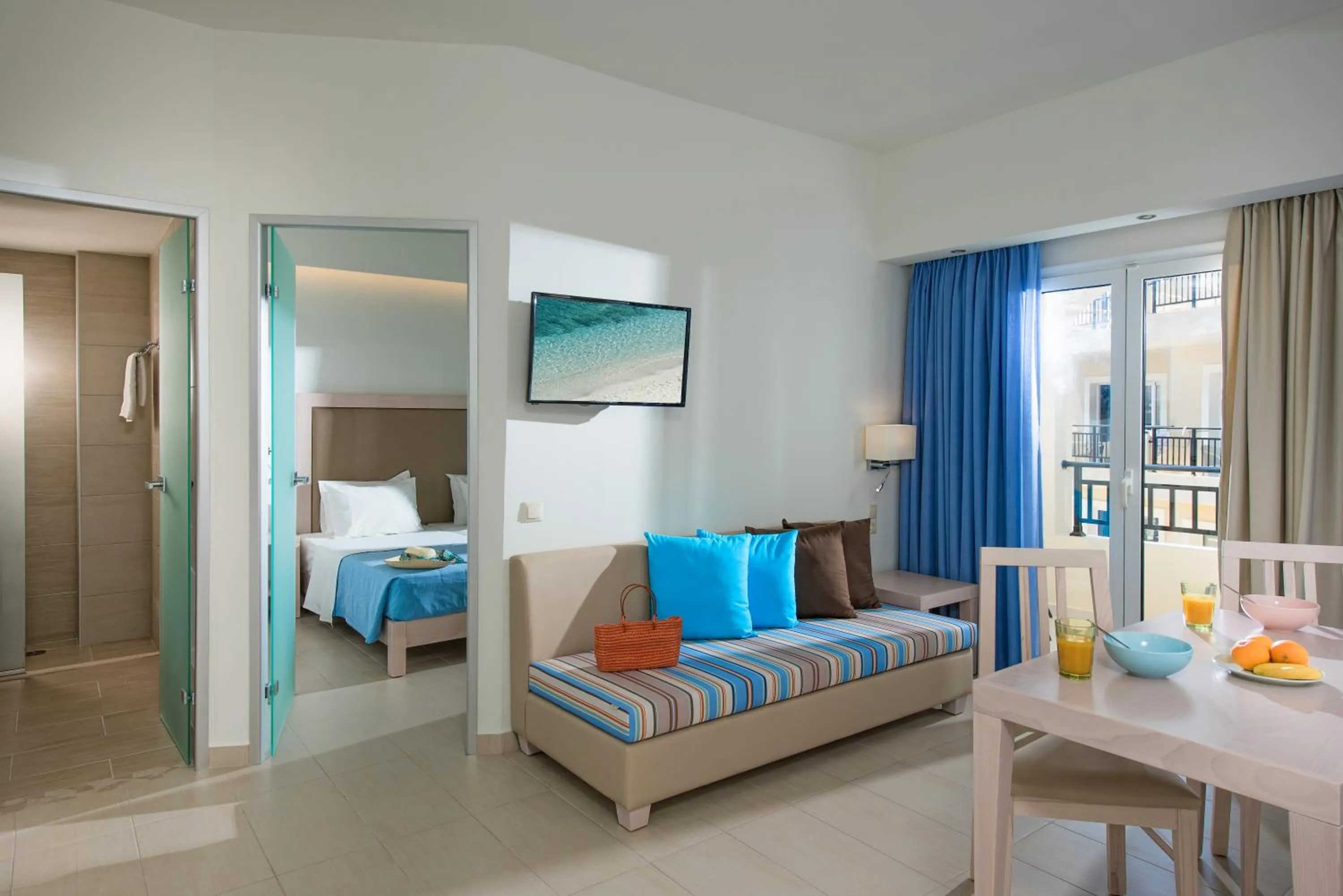 Living room, Bed in Rainbow Apartments