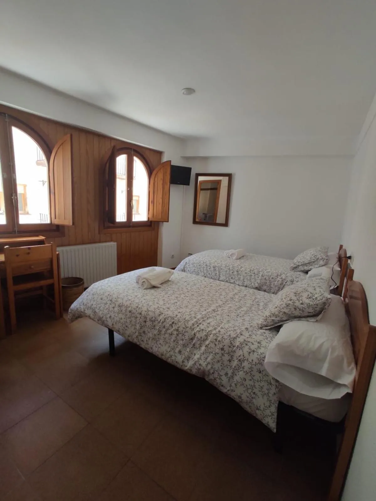 Photo of the whole room, Bed in Pensión Mesón La Lonja - Herbers