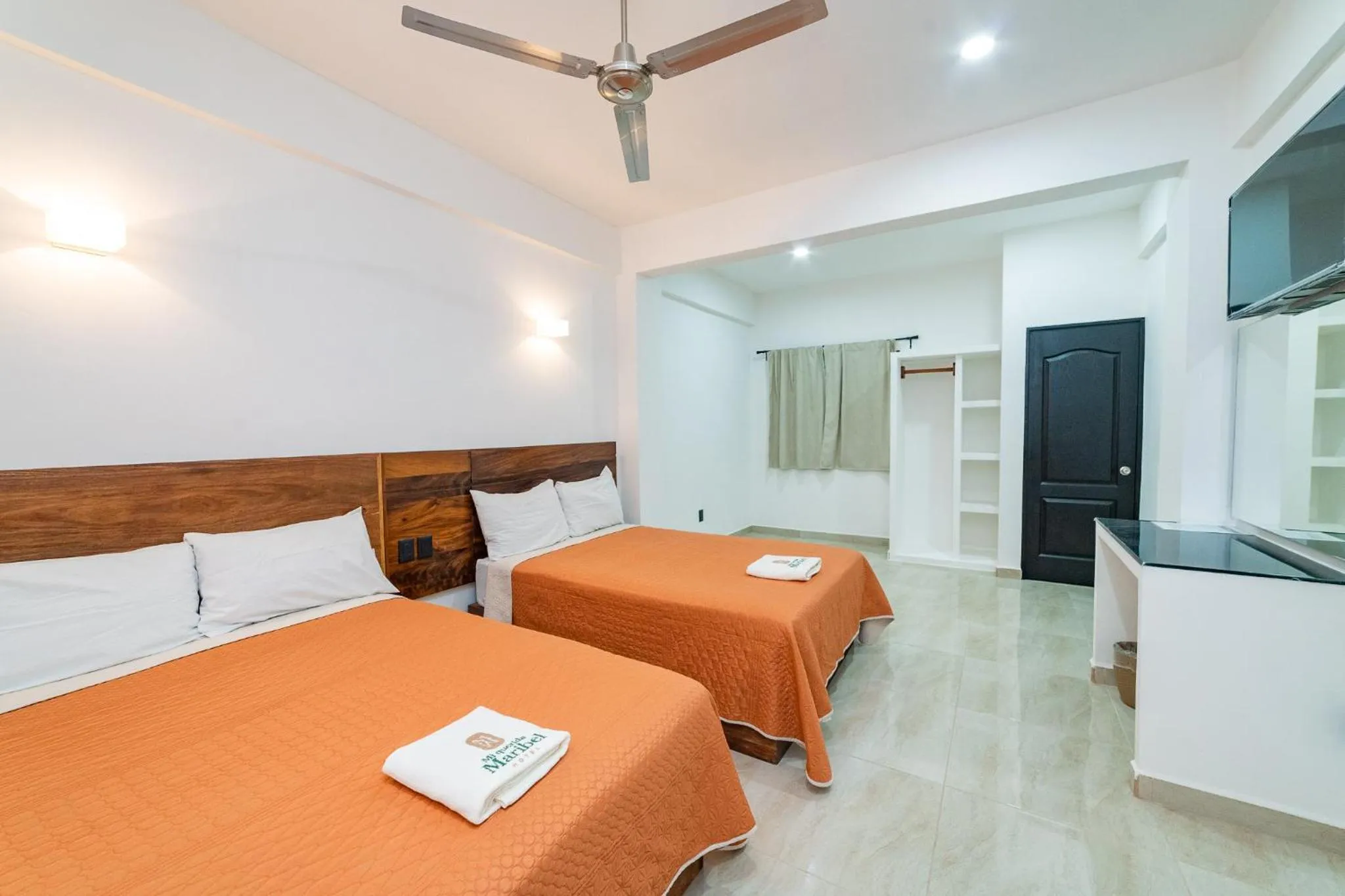 Bed in Mi Querida Maribel Hotel