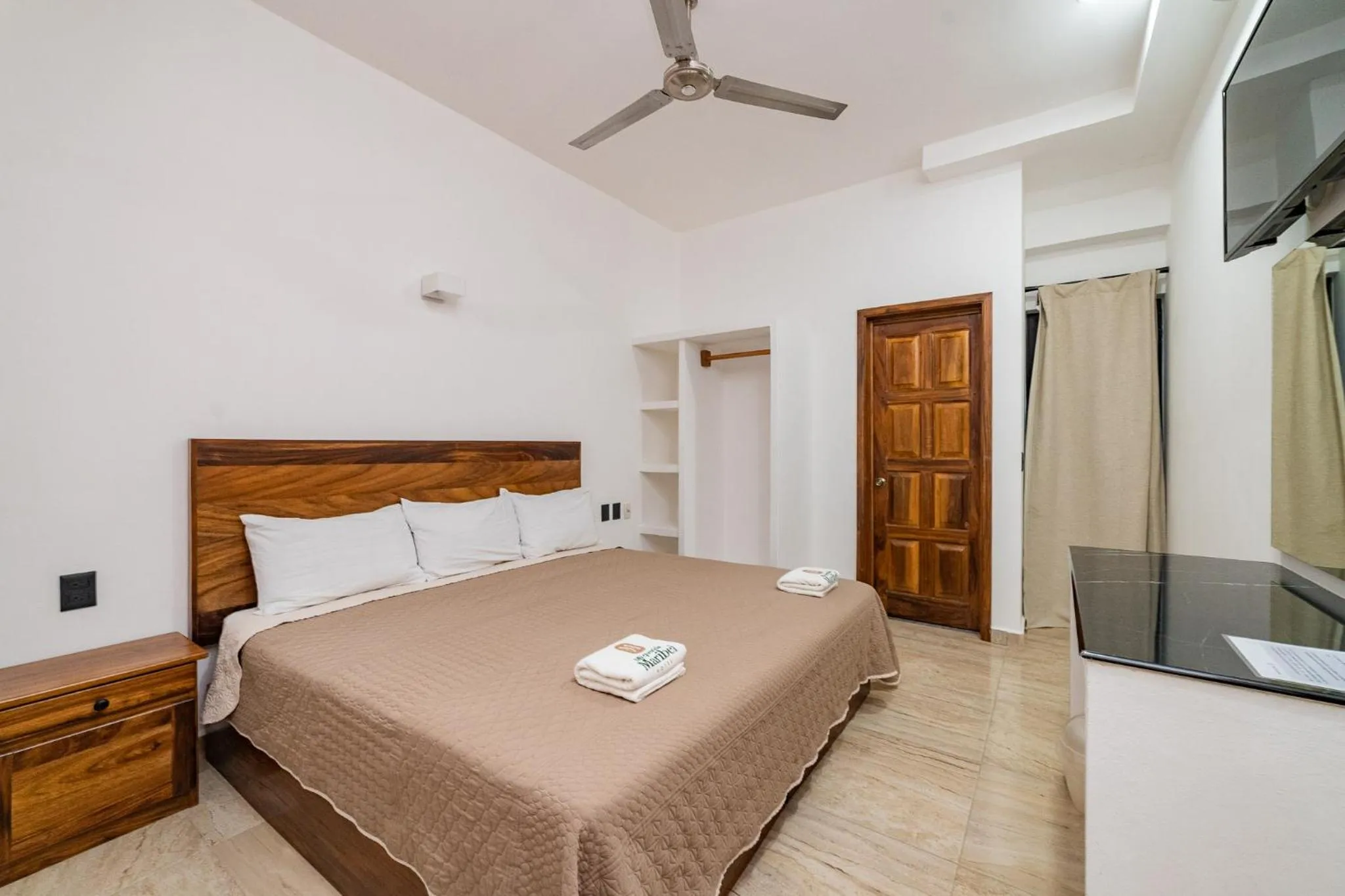 Bed in Mi Querida Maribel Hotel