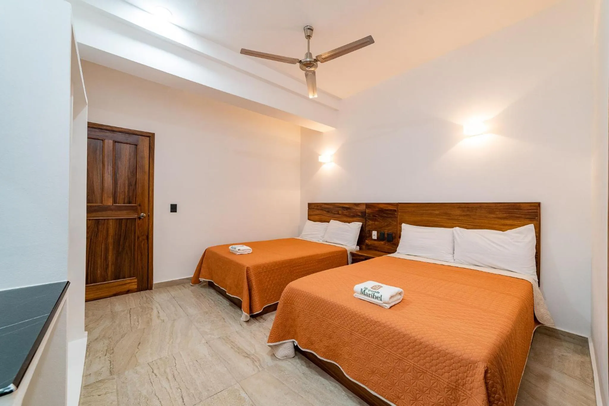 Bed in Mi Querida Maribel Hotel