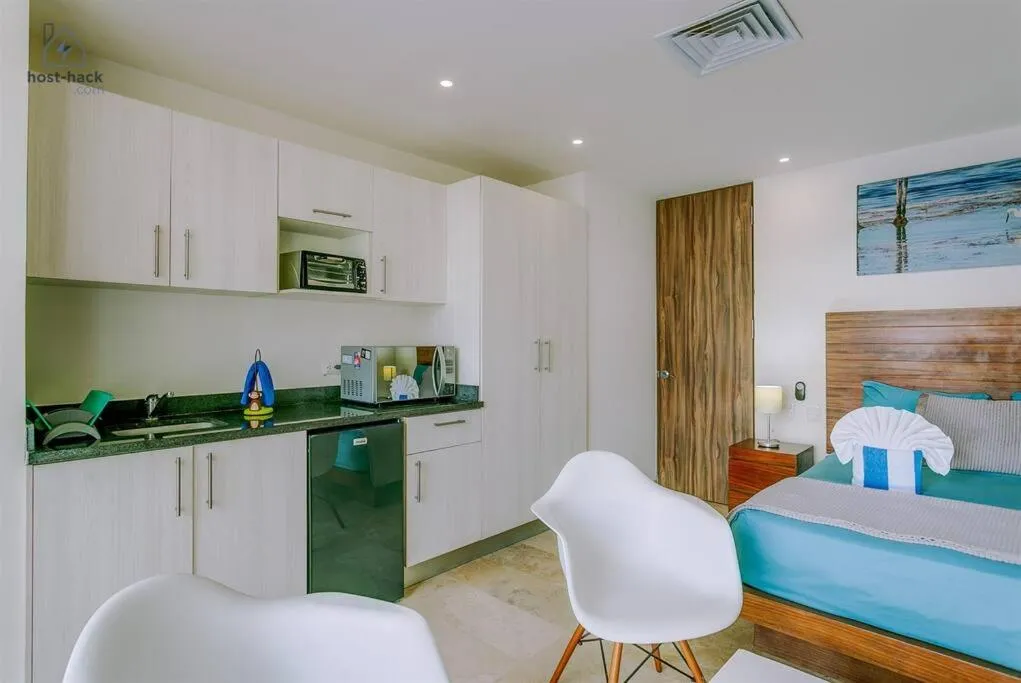 Kitchen or kitchenette in Danzamar 1B with Pool & Rooftop near Mamitas beach