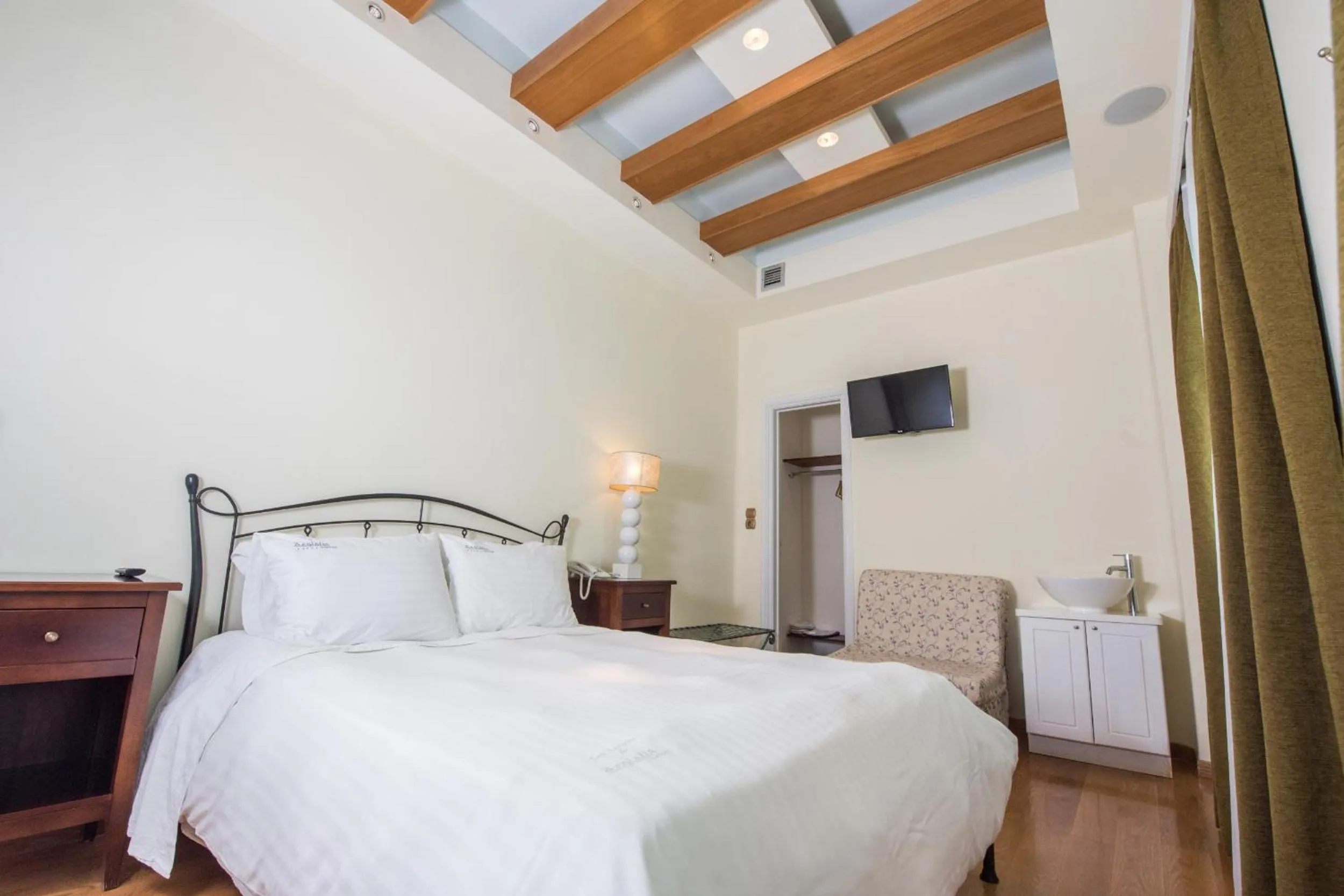 Bed in Aegialis Hotel & Spa