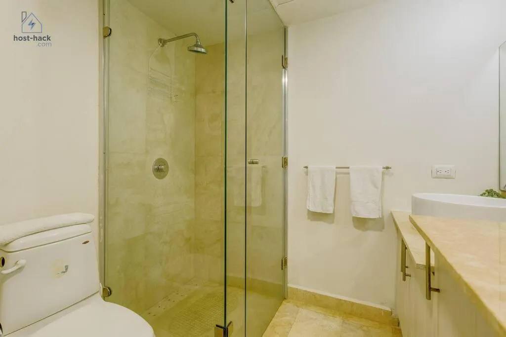 Bathroom in Dpto a 5 min de la Playa con Piscina y Rooftop