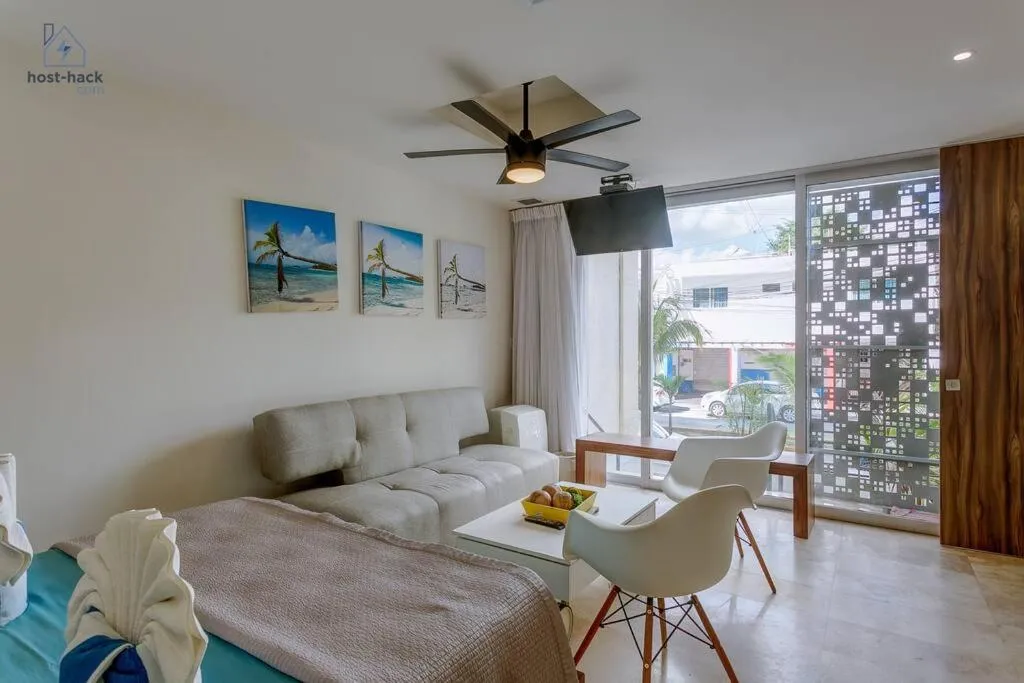 Living room in Dpto a 5 min de la Playa con Piscina y Rooftop