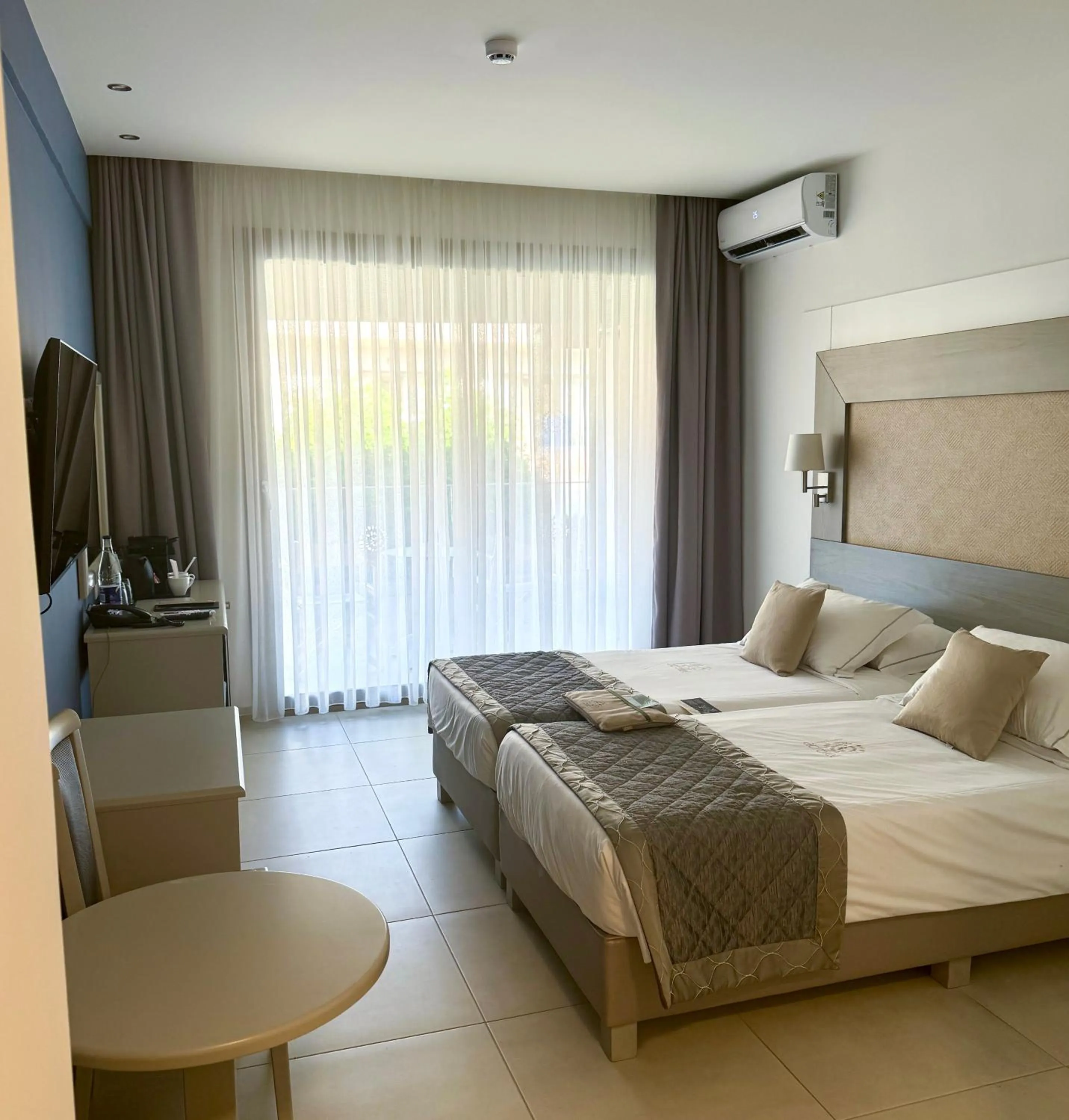 Bed in Acrotel Athena Pallas & Residence