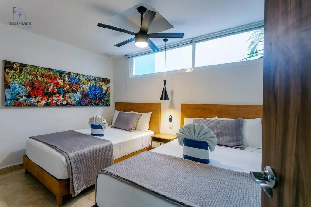 Photo of the whole room, Bed in Danzamar 4, 5 blocks away from Playa Pelicanos