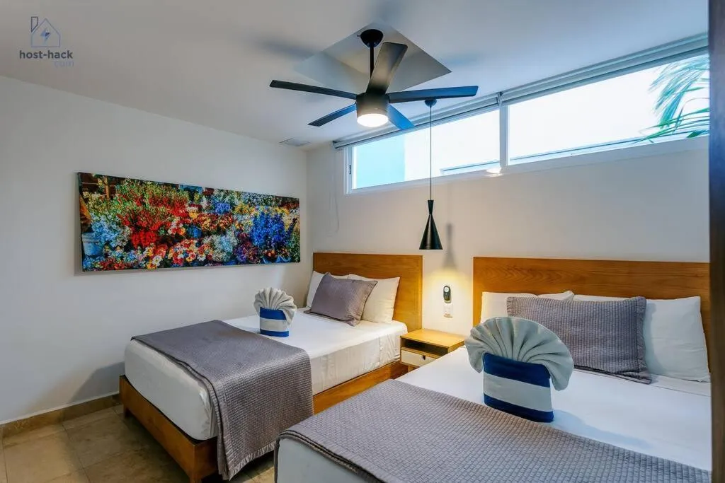 Photo of the whole room, Bed in Danzamar 4, 5 blocks away from Playa Pelicanos