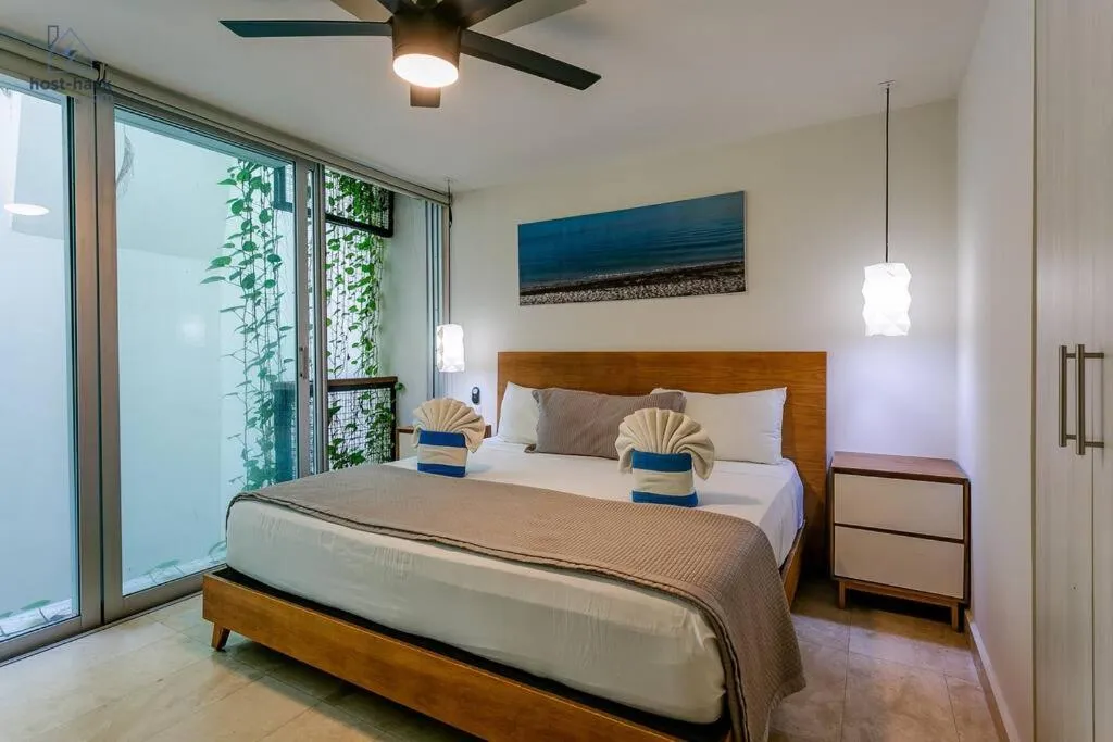 Photo of the whole room, Bed in Danzamar 4, 5 blocks away from Playa Pelicanos