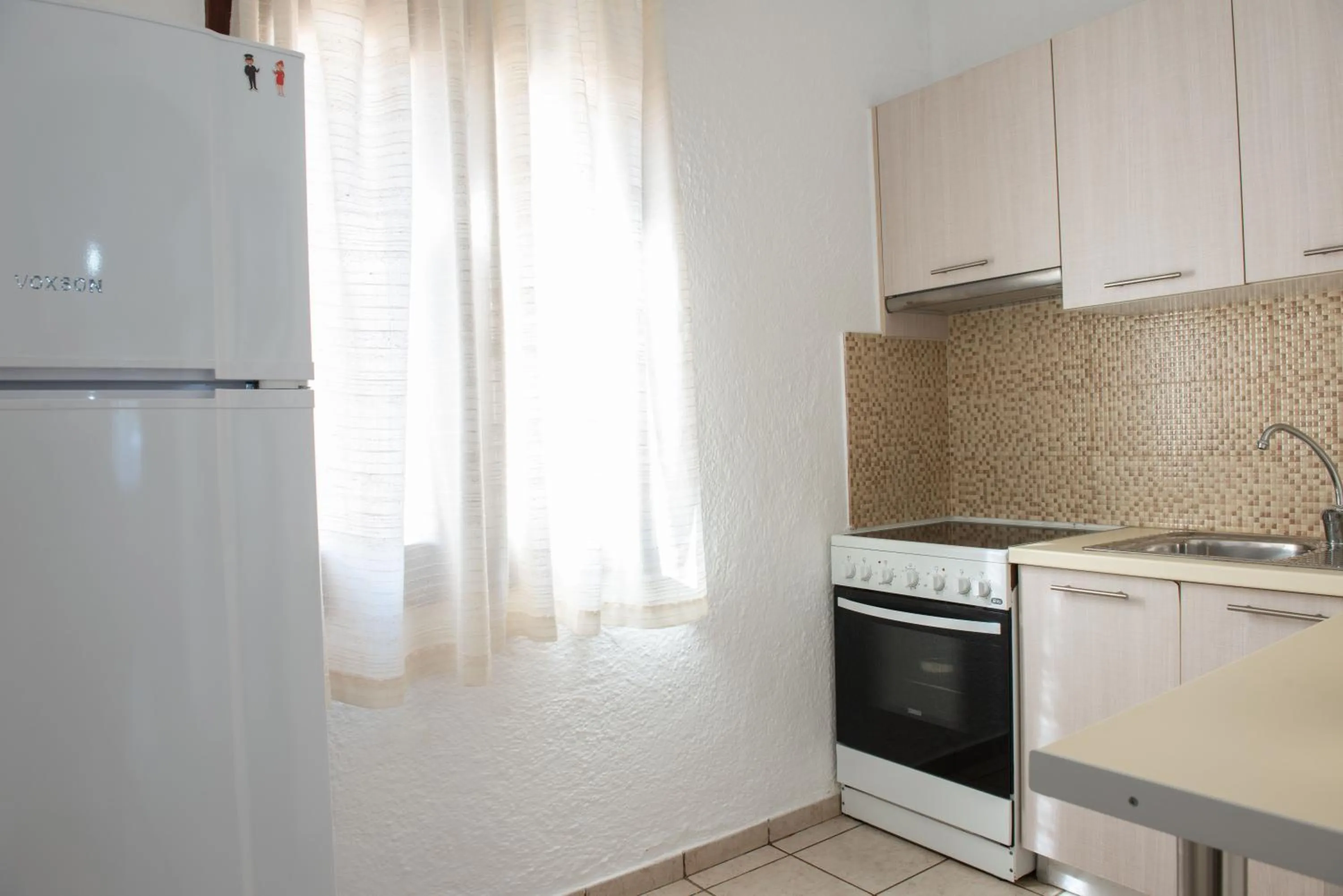 Kitchen or kitchenette in Vangelis Villas