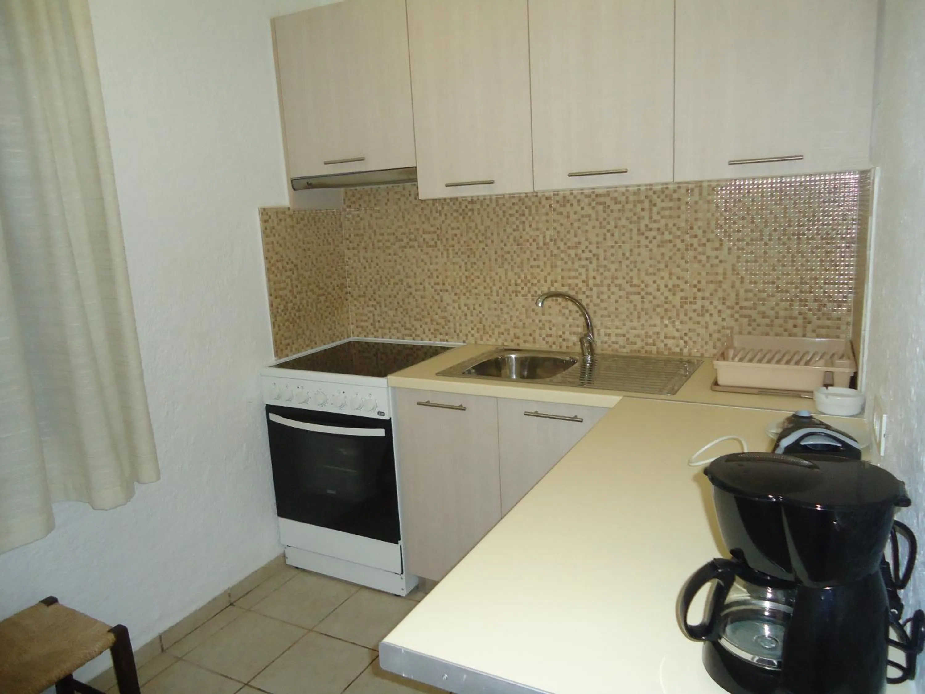 Kitchen or kitchenette in Vangelis Villas