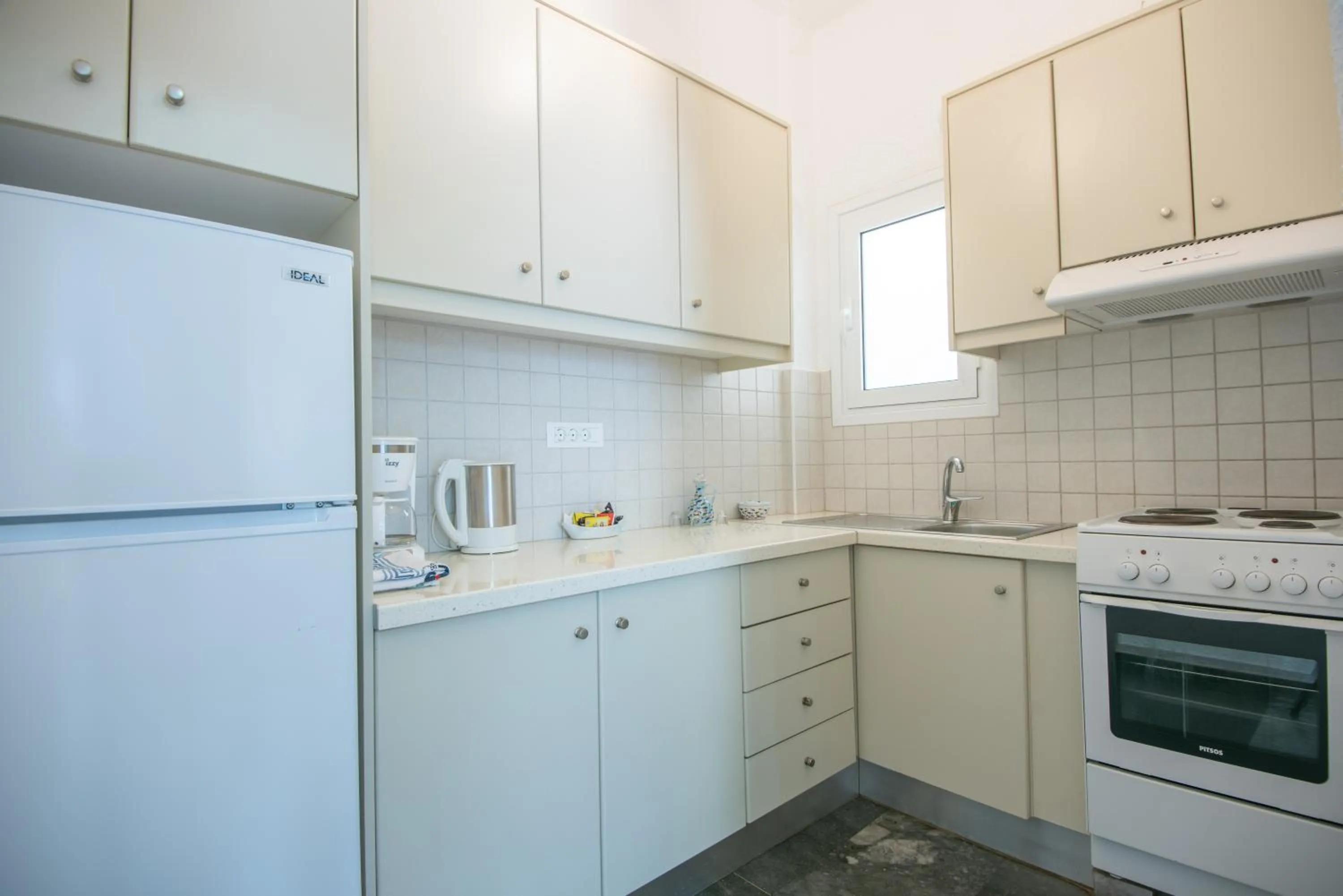 Kitchen or kitchenette in Vangelis Villas