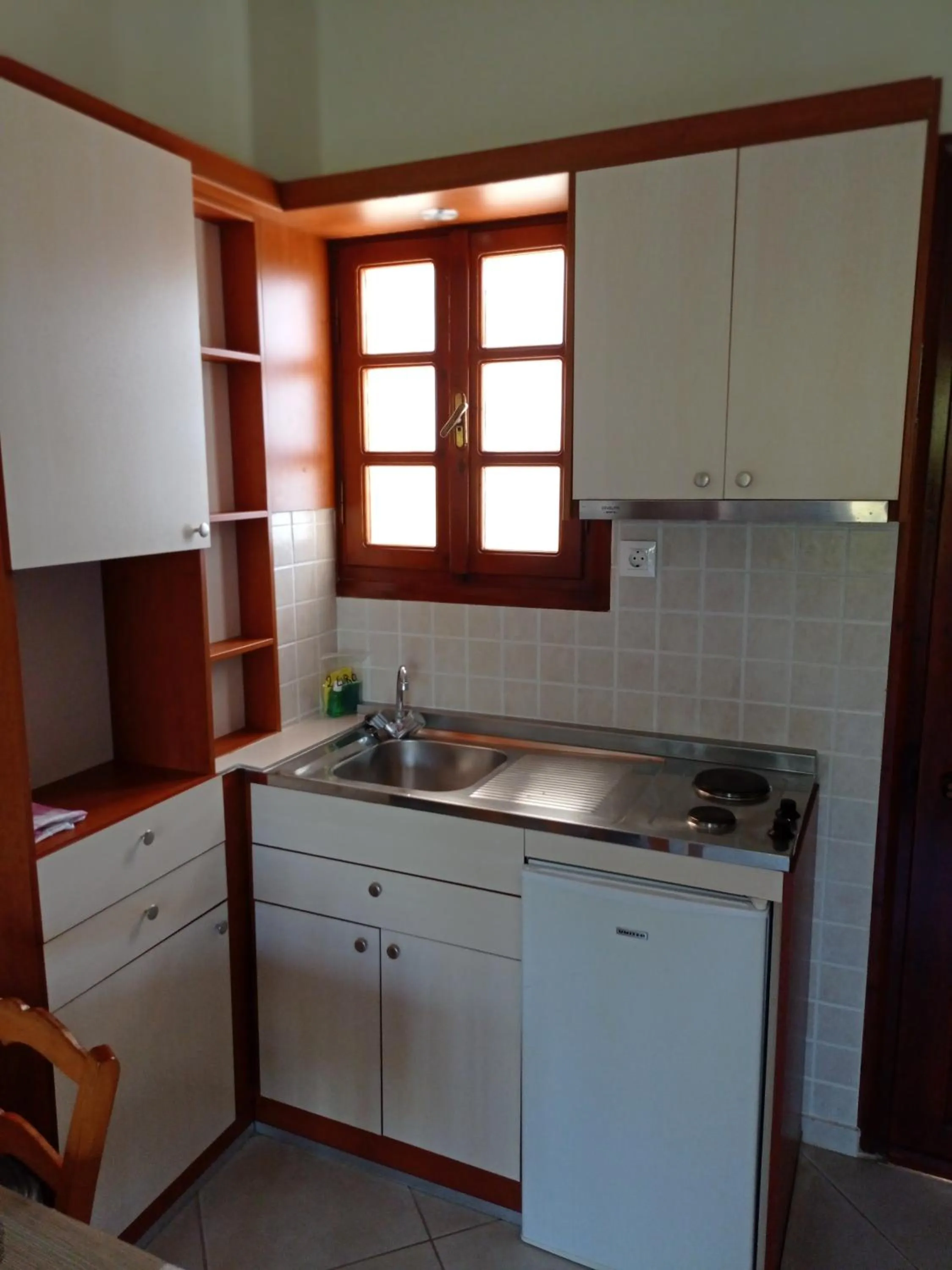 Kitchen or kitchenette in Alexandros Studios