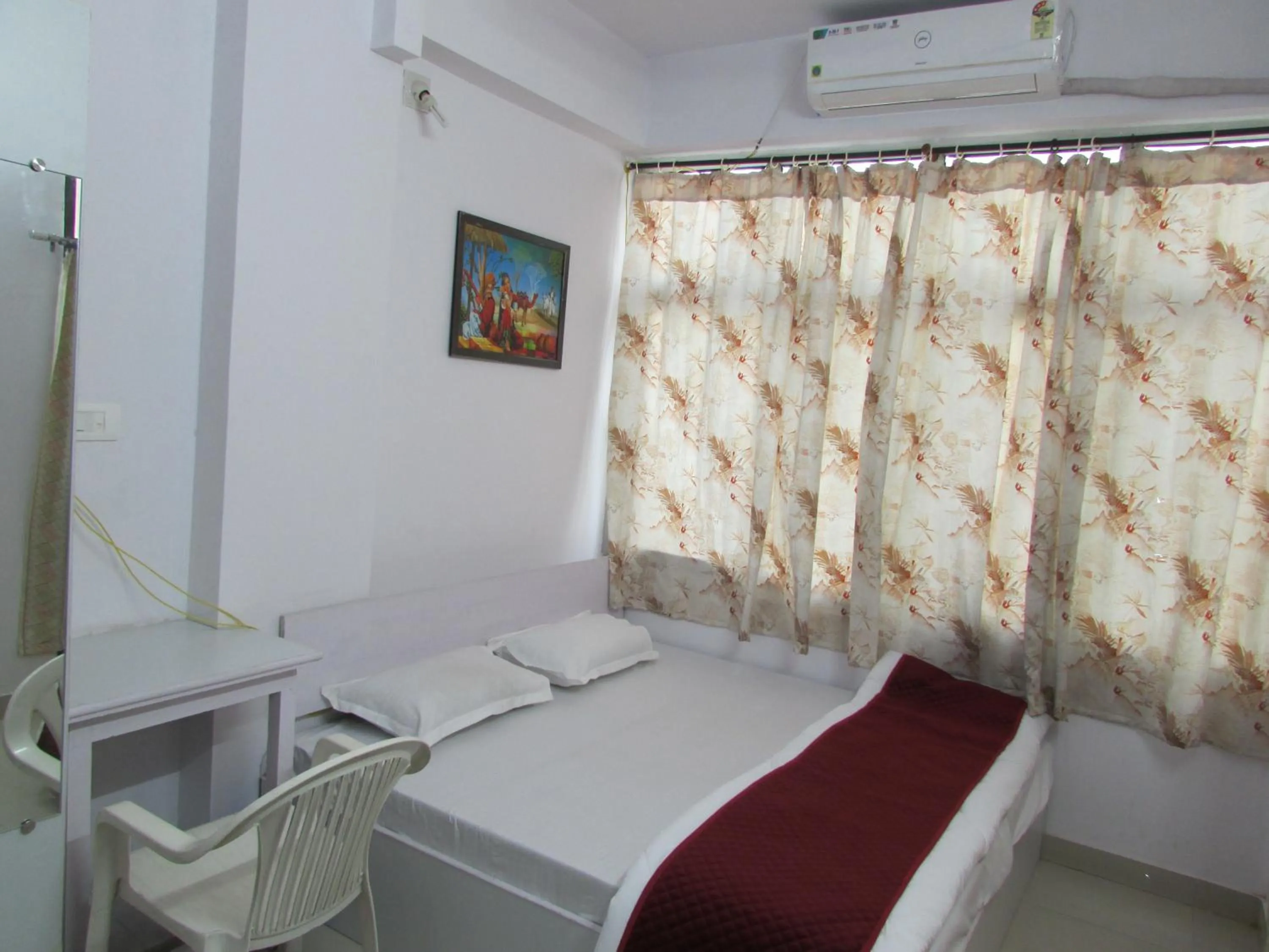 Photo of the whole room, Bed in Ashish Guest House, Udaipole