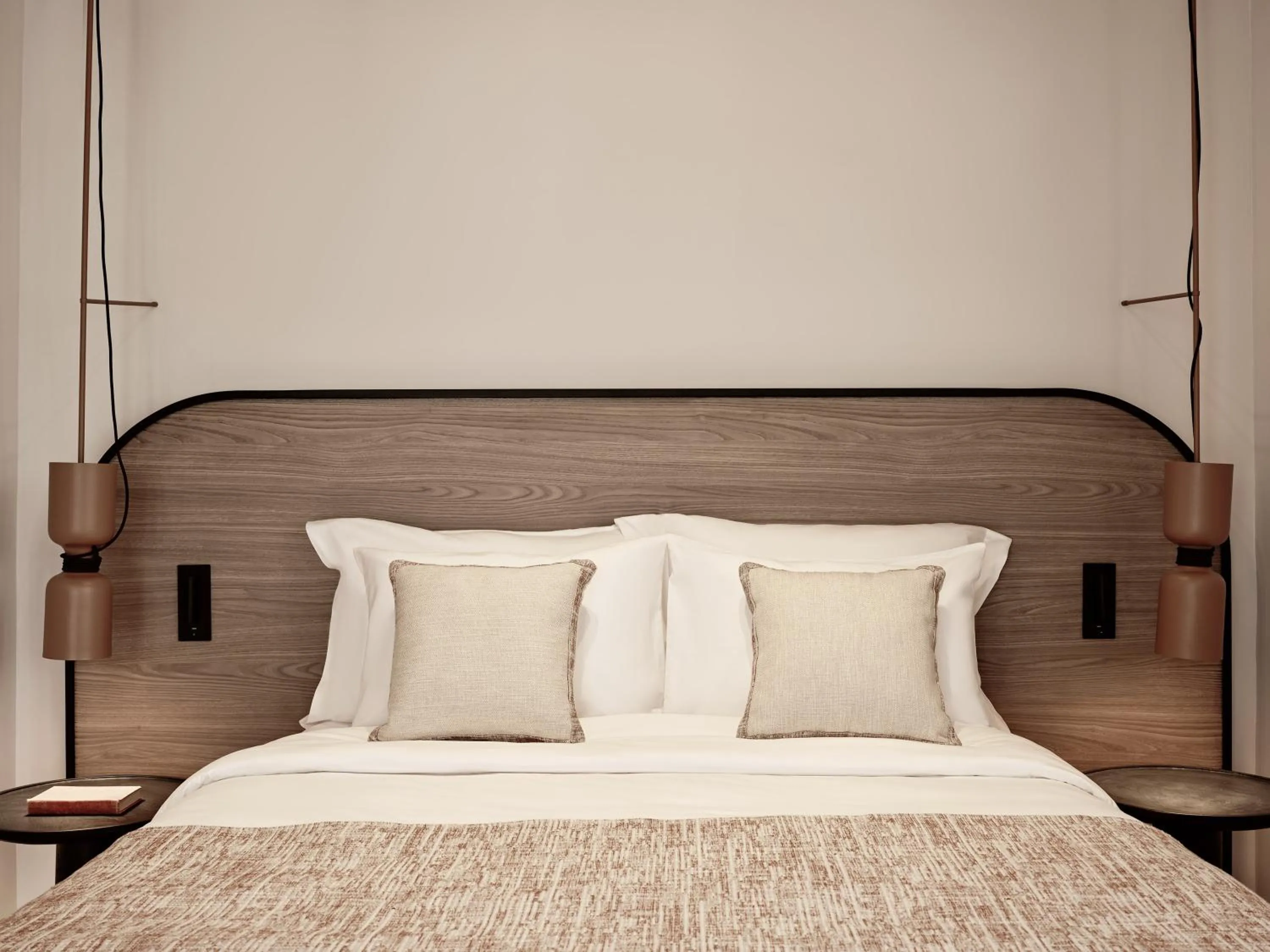 Bed in NAUMA PAROS Design Boutique Hotel