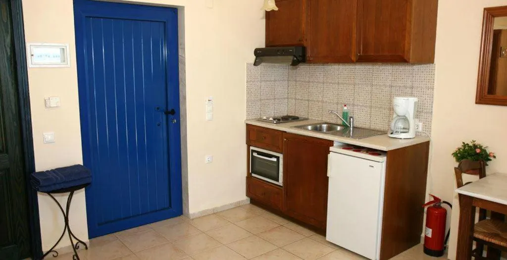 Kitchen or kitchenette in Nymphes Luxury Apartments