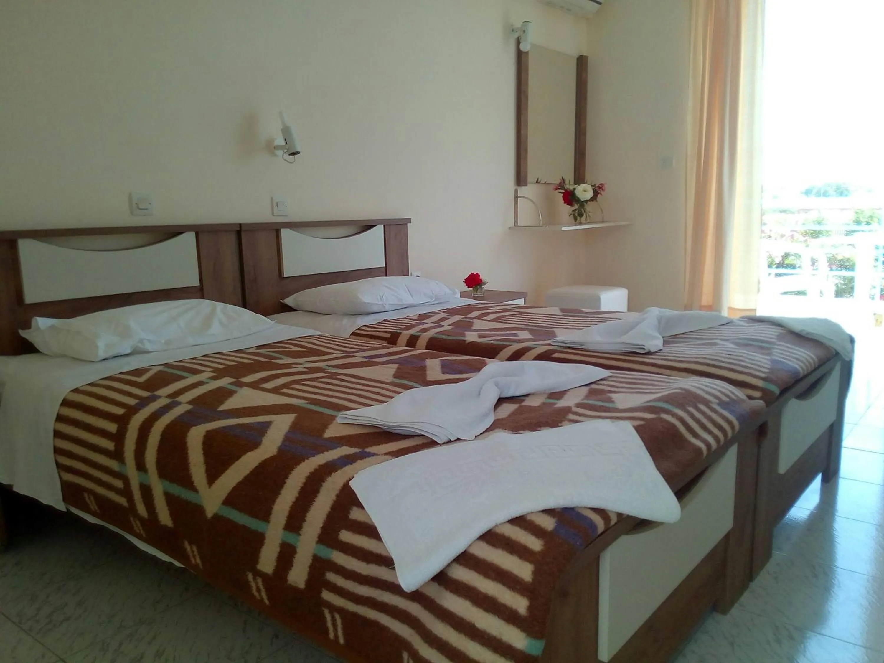 Photo of the whole room, Bed in Leonidas Hotel & Studios