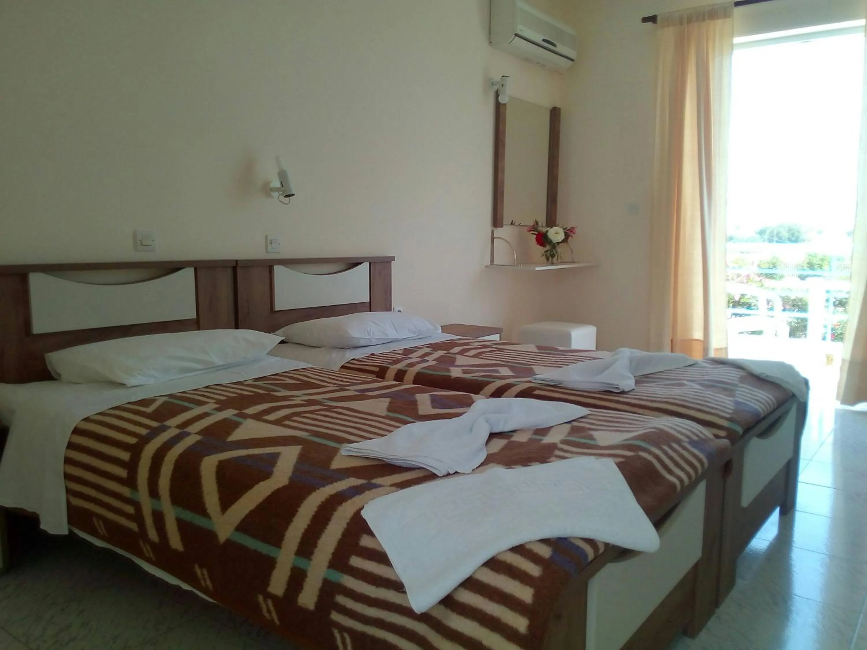 Photo of the whole room, Bed in Leonidas Hotel & Studios