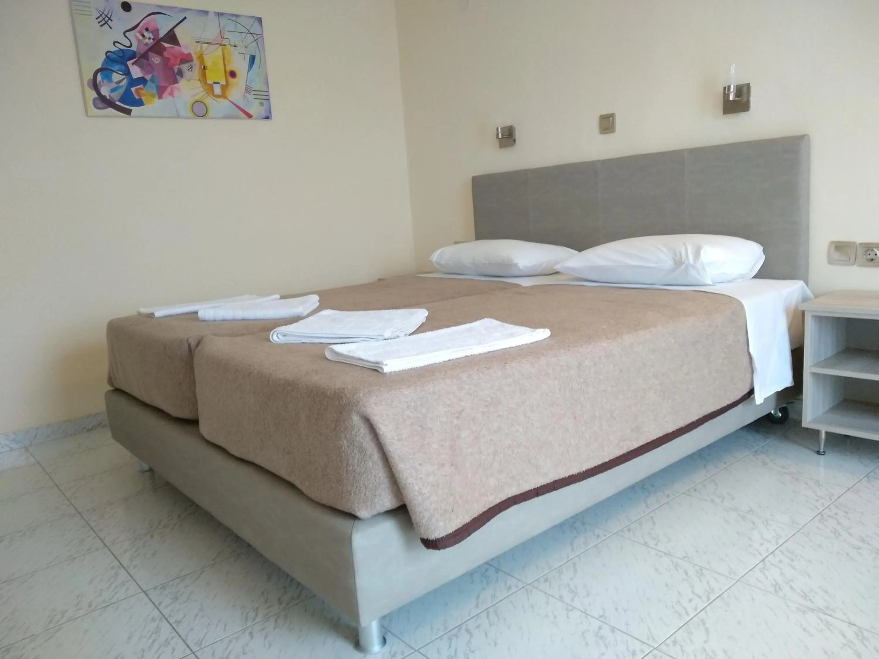 Bed in Leonidas Hotel & Studios