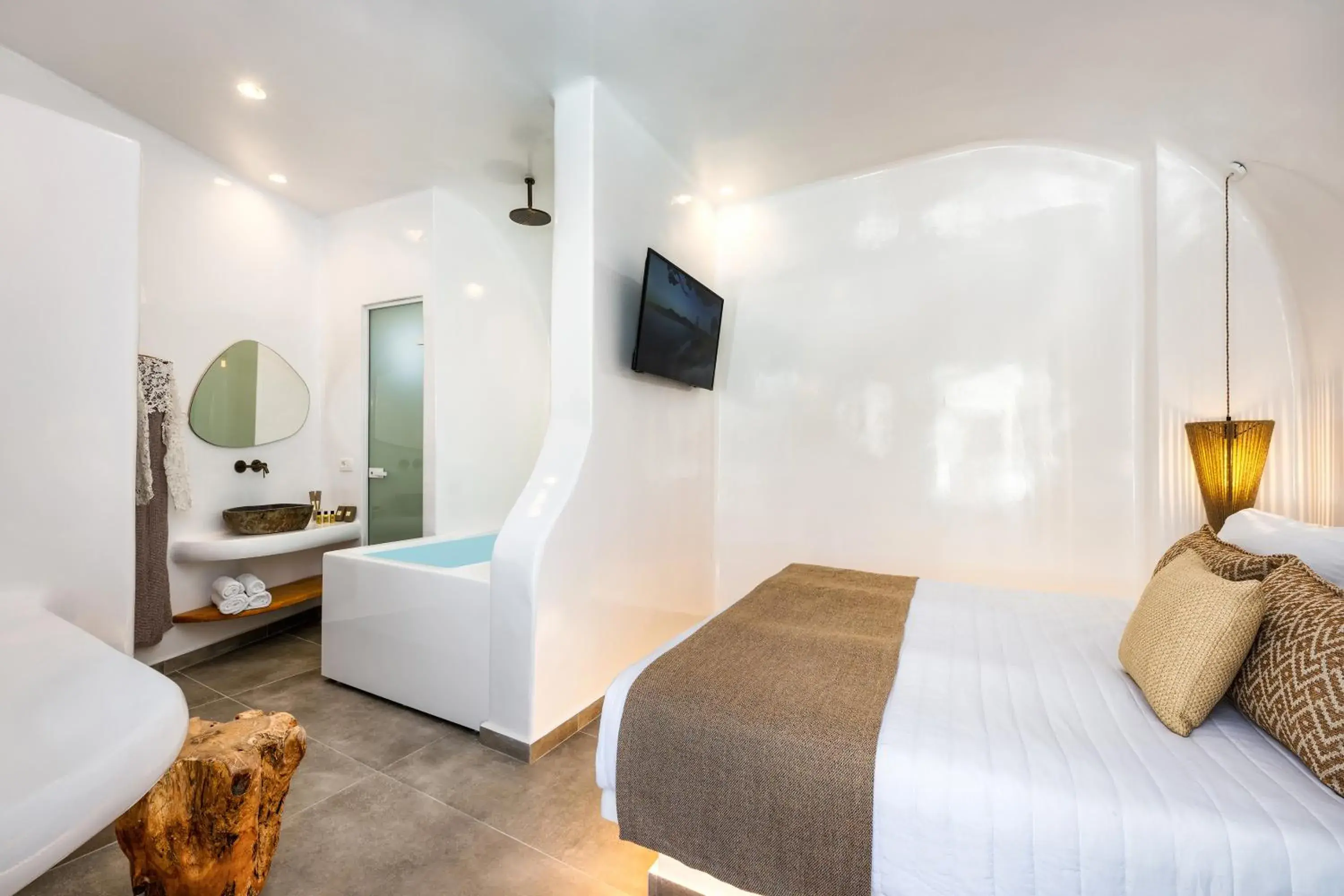 Cave Hot Tub Suite with Pool View in Evgenia Villas & Suites by Calm Collection Cave Hot Tub Suite with Pool View in Evgenia Villas & Suites by Calm Collection