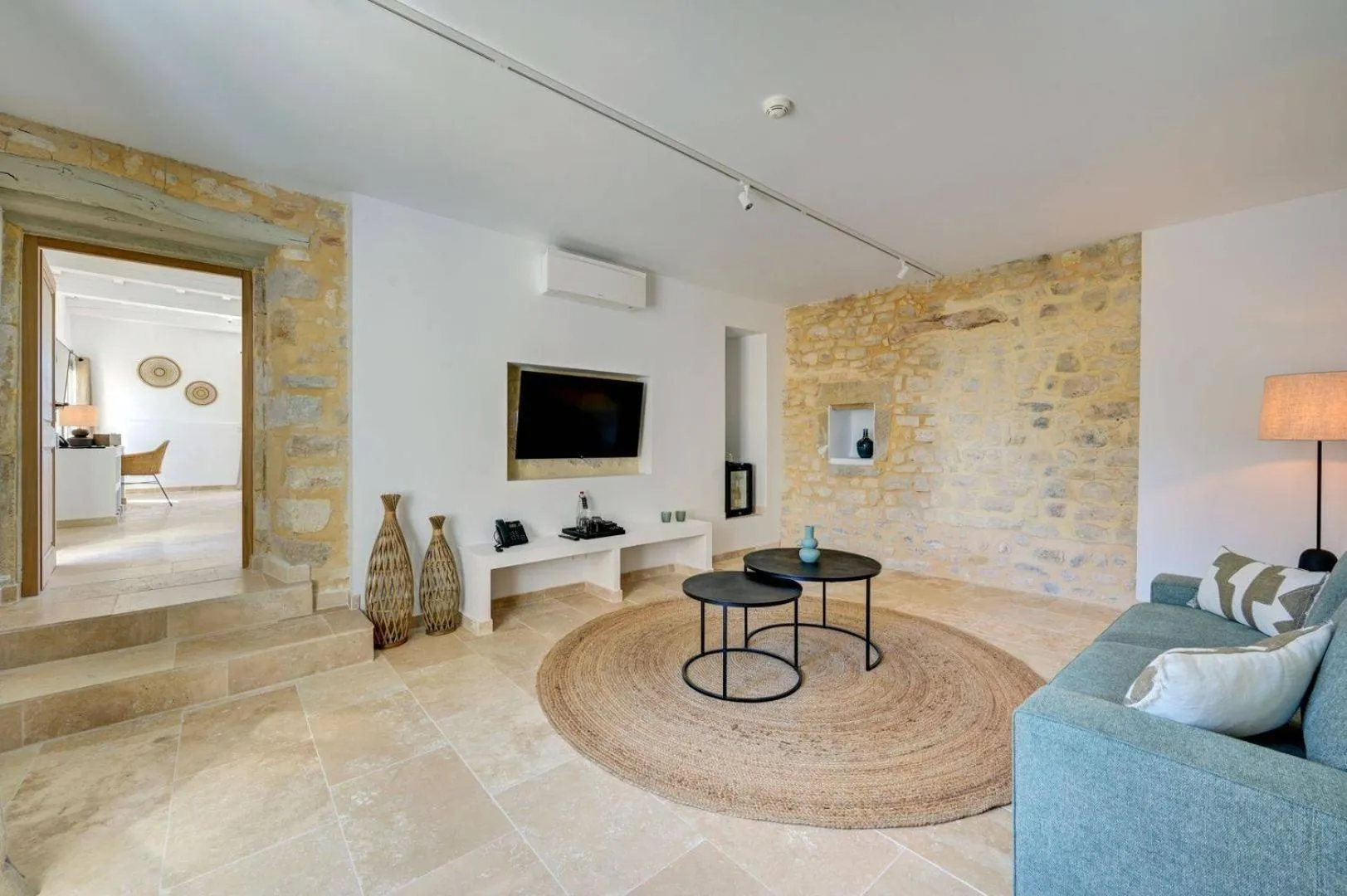 Communal lounge/ TV room in Domaine de Privadière & Spa