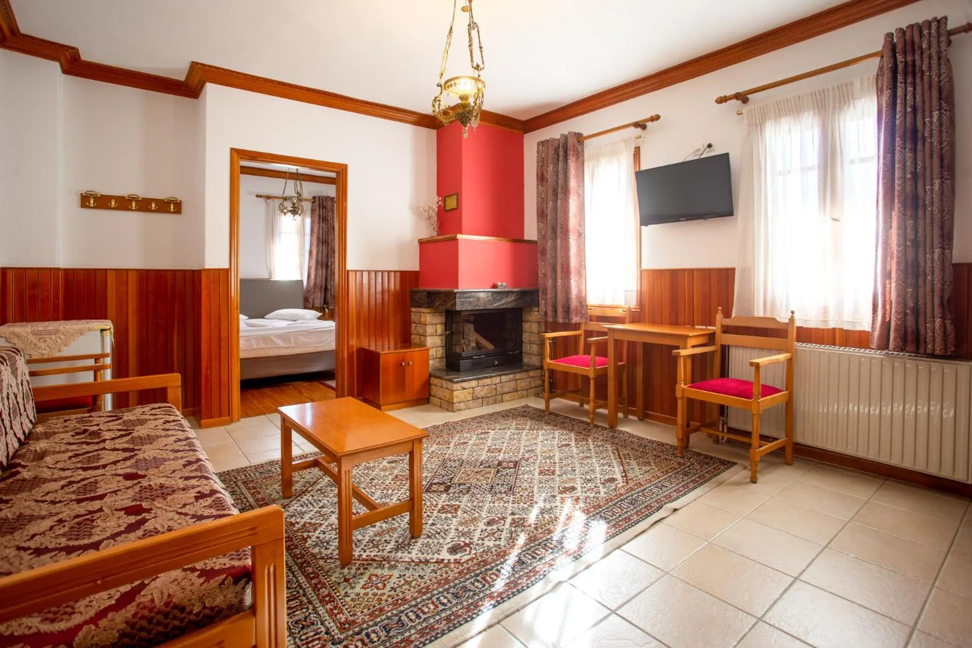 Living room, Bed in Hotel Adonis