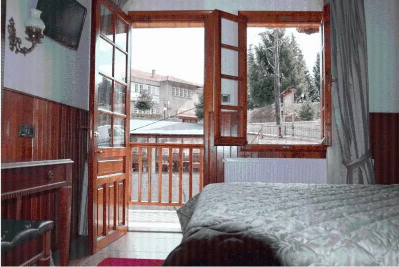 Bed in Hotel Apollon