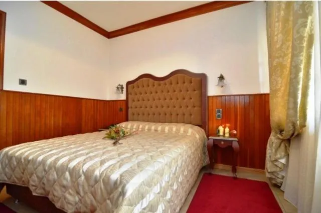 Bed in Hotel Apollon