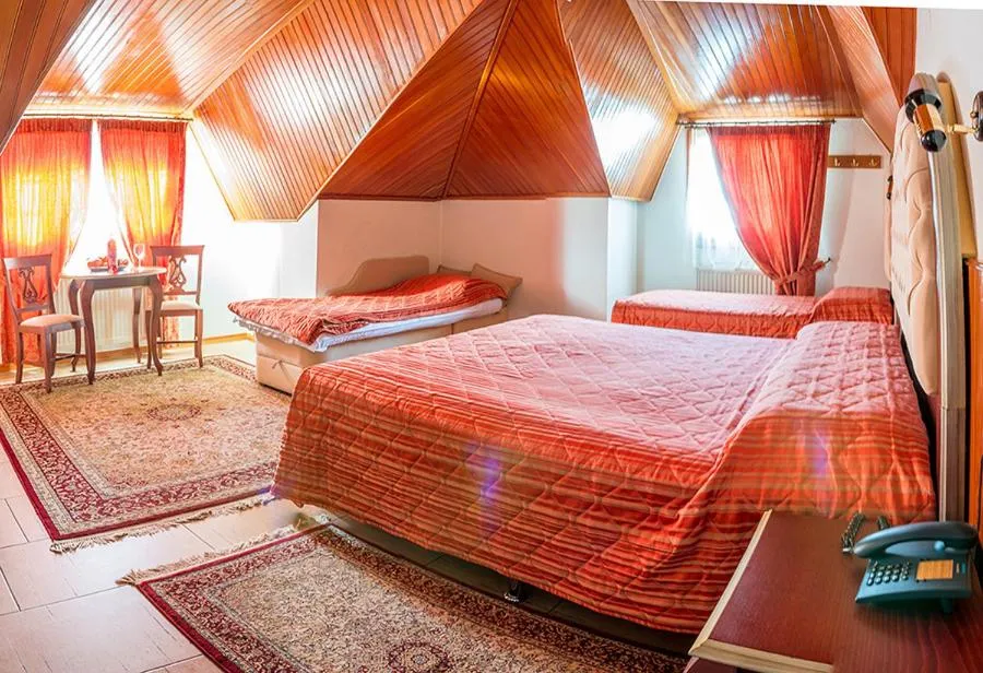 Bed in Hotel Apollon