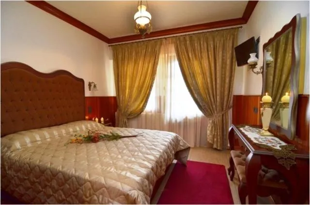 Bed in Hotel Apollon