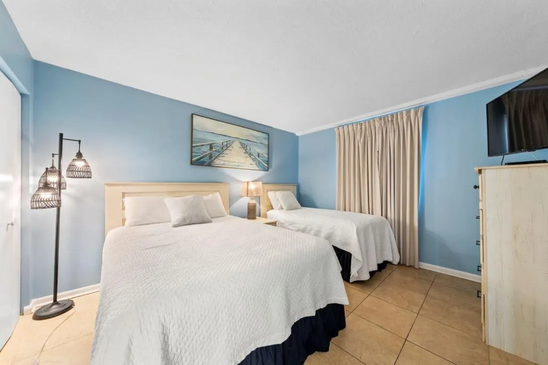 Bed in Romar Tower 7C by Youngs Suncoast