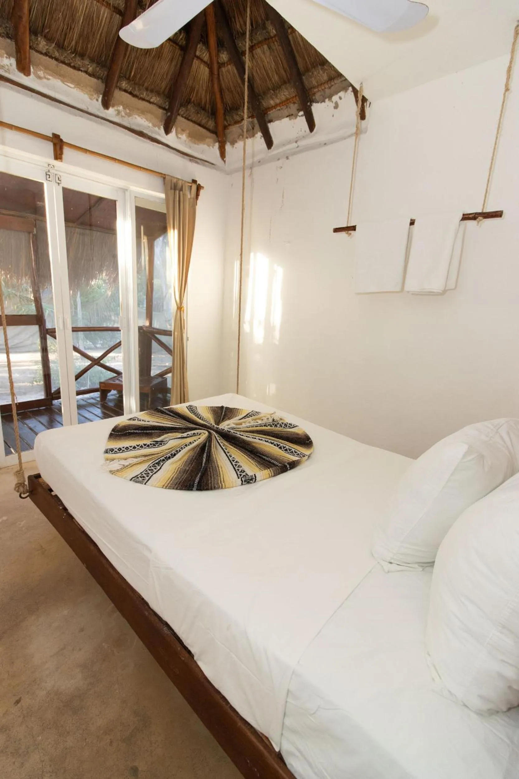Photo of the whole room, Bed in Hotel Ak'Na Holbox