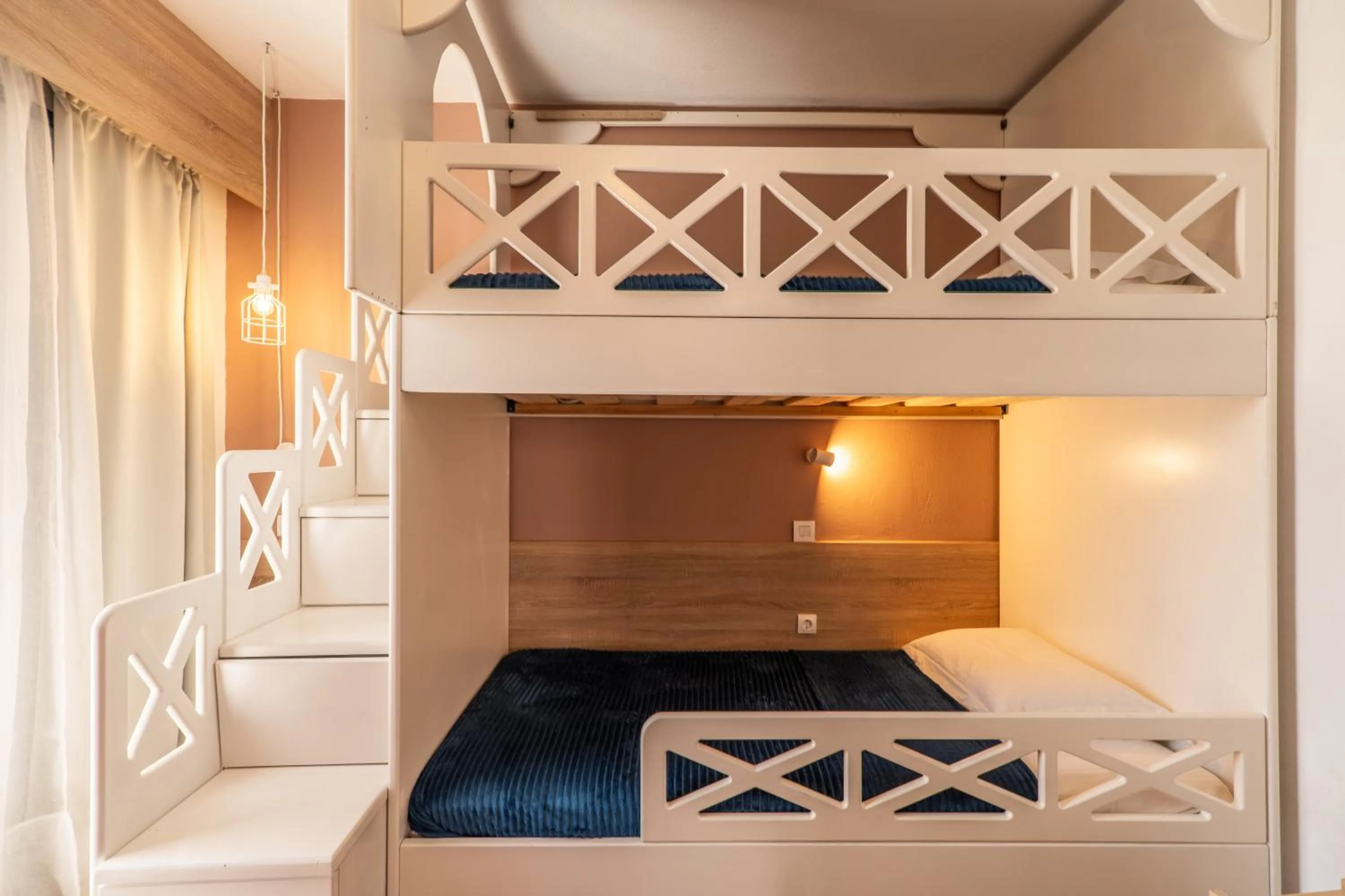 Bed in Paradisio Baby & Kinder Apartments