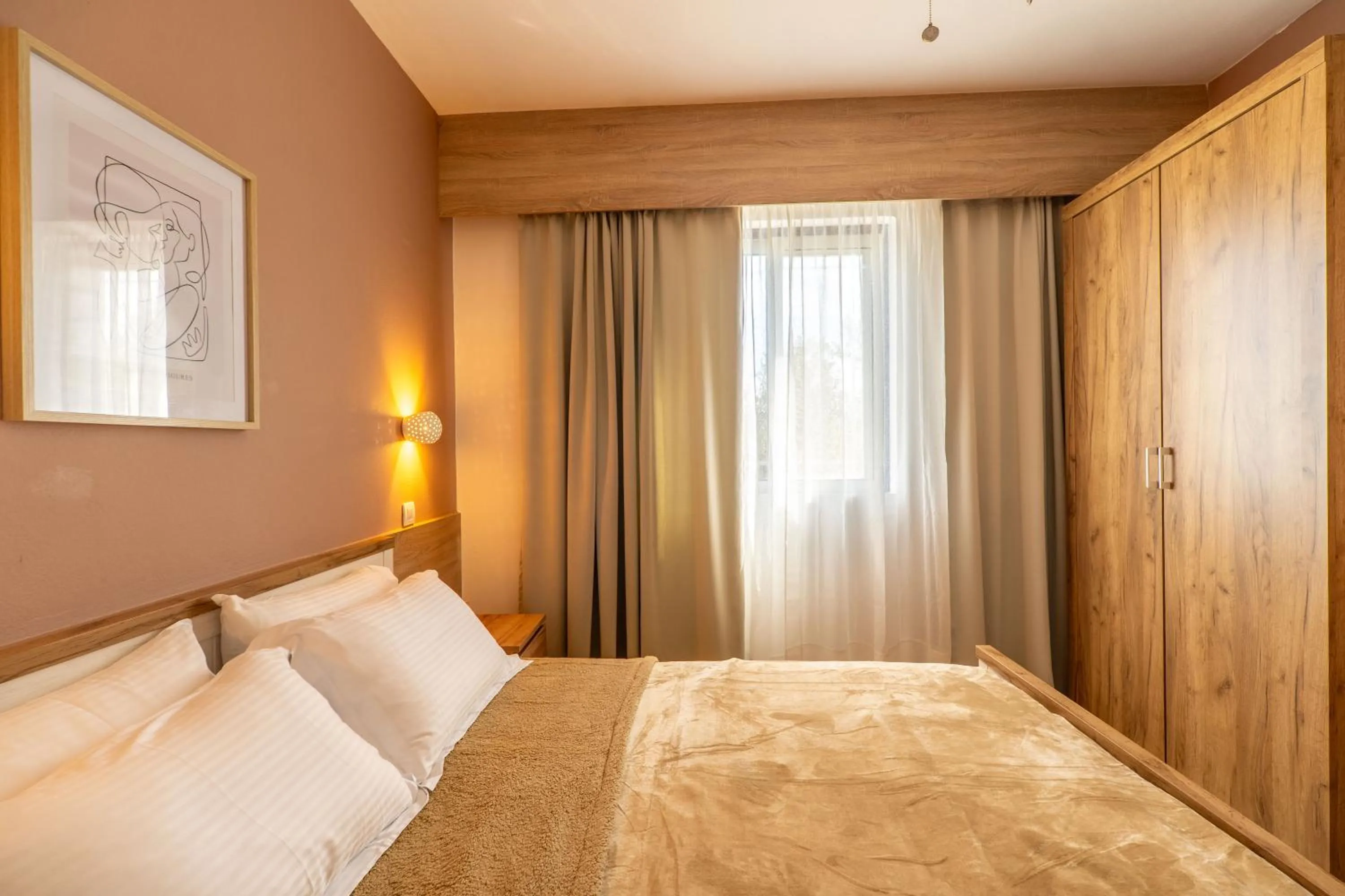 Bed in Paradisio Baby & Kinder Apartments