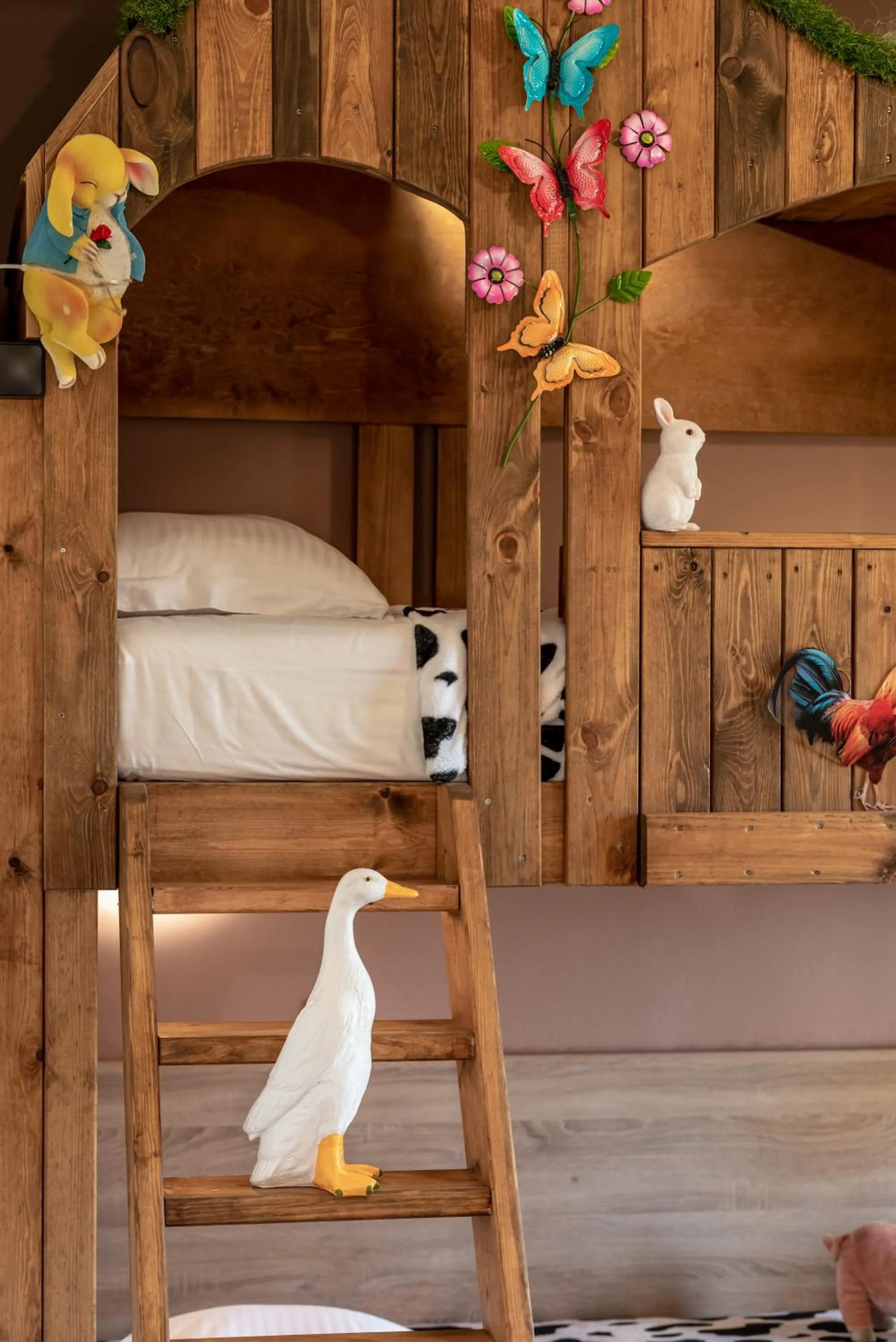 Bed in Paradisio Baby & Kinder Apartments