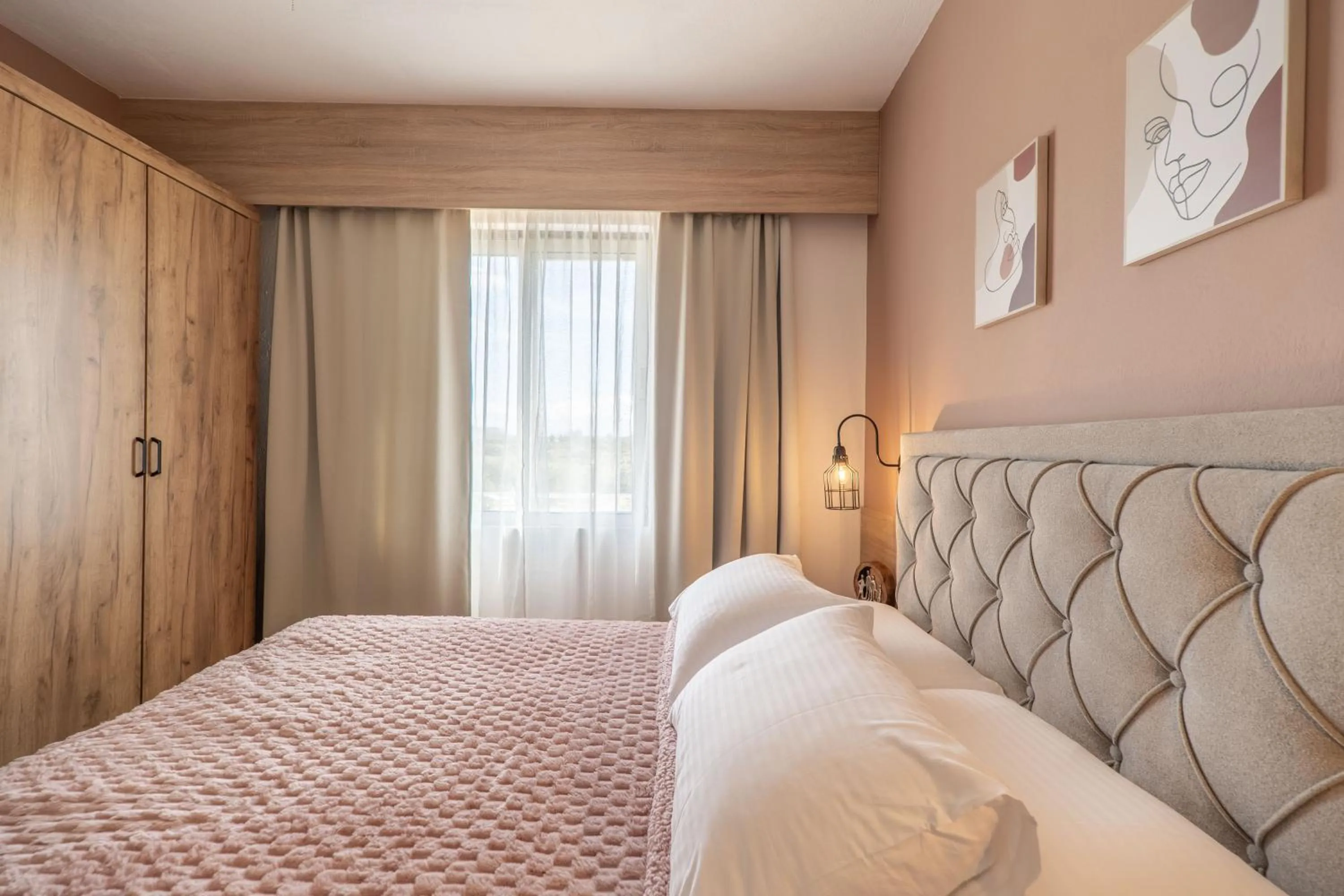 Bed in Paradisio Baby & Kinder Apartments