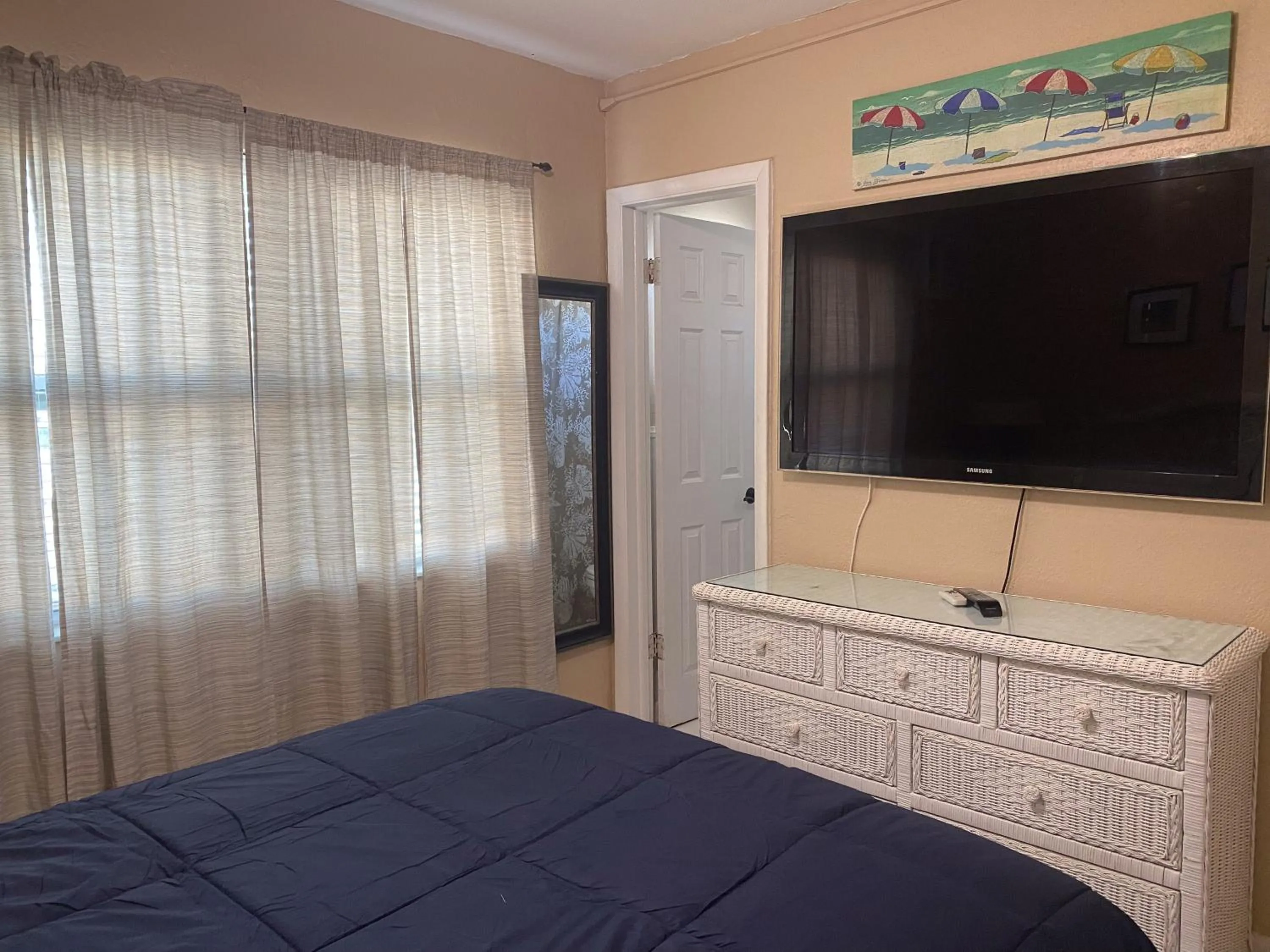 Bed in Oasis Palms Resort