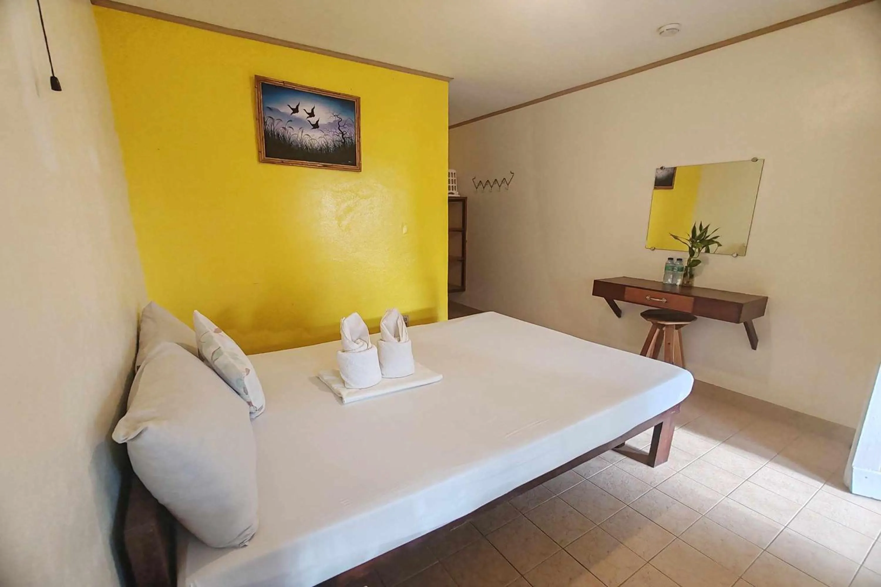 Bed in Summer Homes Beach Front Resort and Cottages Port Barton