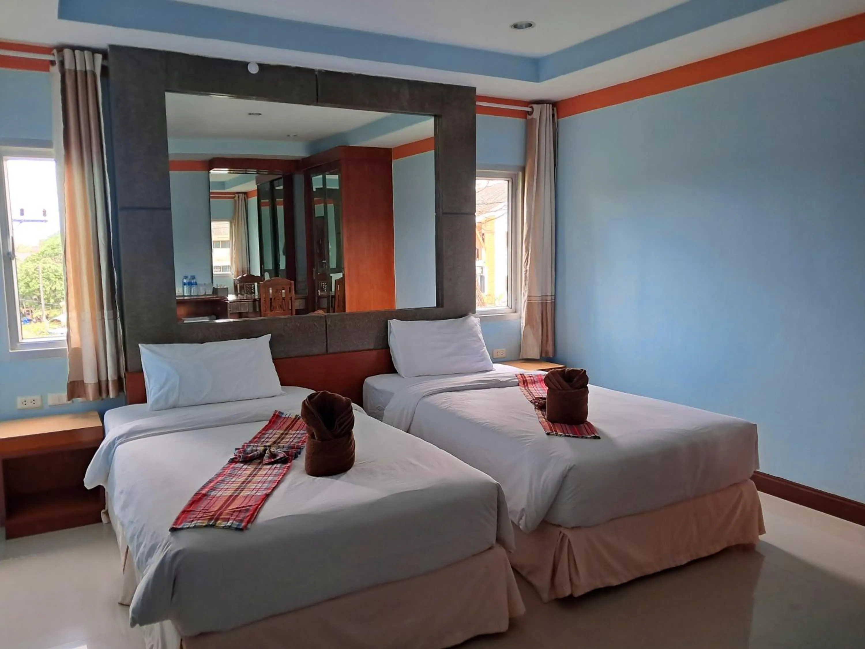 Bed in Baan Thara Guesthouse